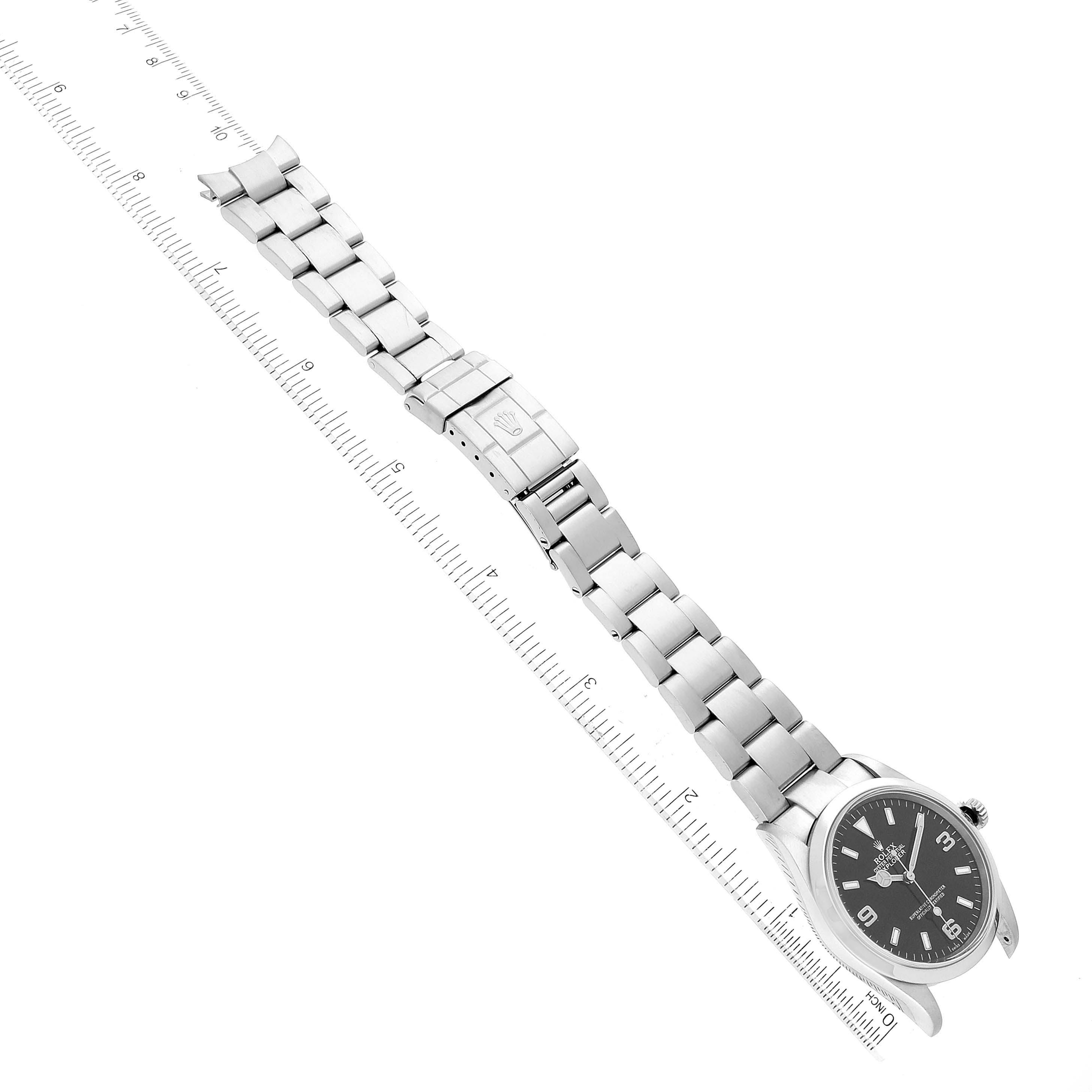 The image shows a Rolex Explorer 114270 Men's Stainless Steel Black Dial 114270 Men's Stainless Steel Black Dial watch laid flat, showcasing the dial, bracelet, and clasp from an overhead angle.