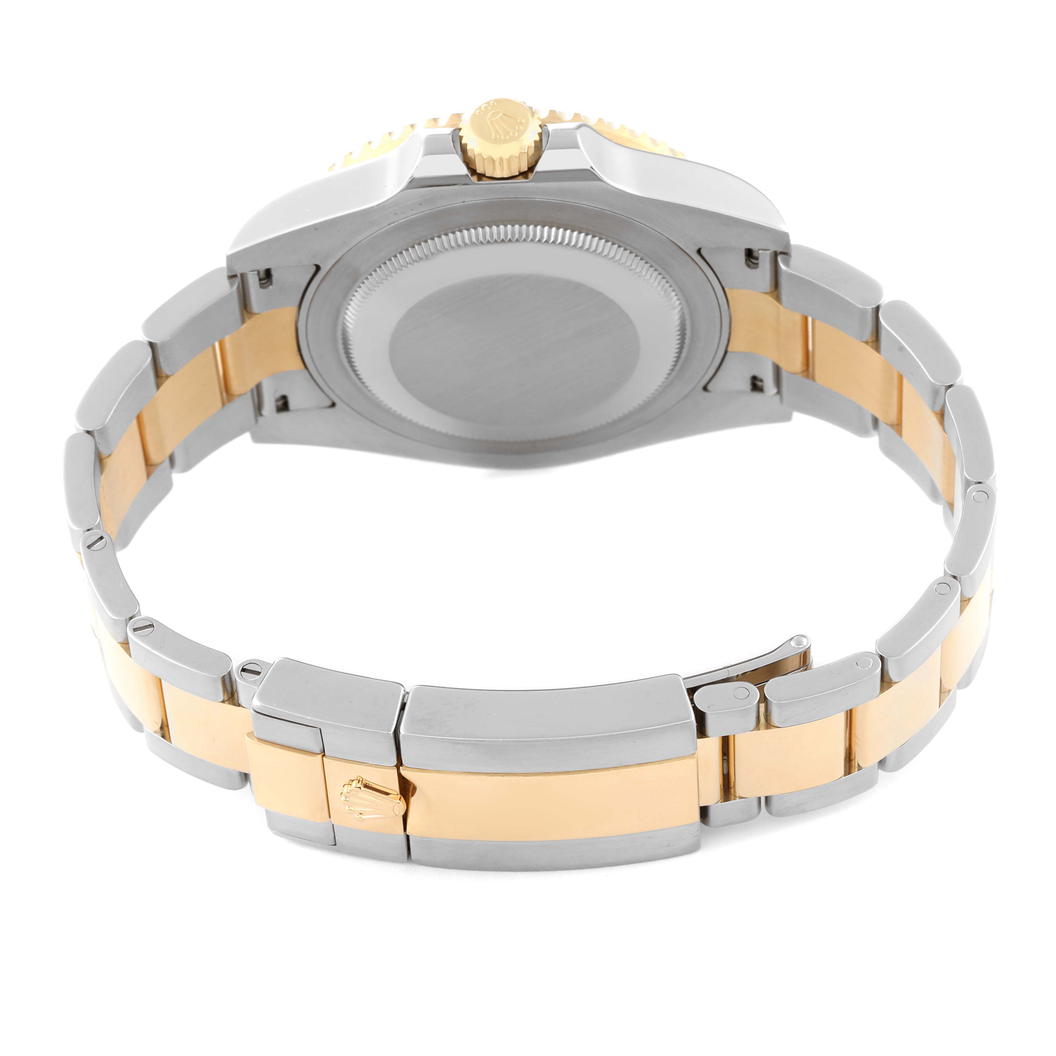 The image shows the back view of a Rolex GMT-Master 116713 Men's Steel and Gold (two tone) Black Dial 116713 Men's Steel and Gold (two tone) Black Dial watch, highlighting its two-tone bracelet and clasp.