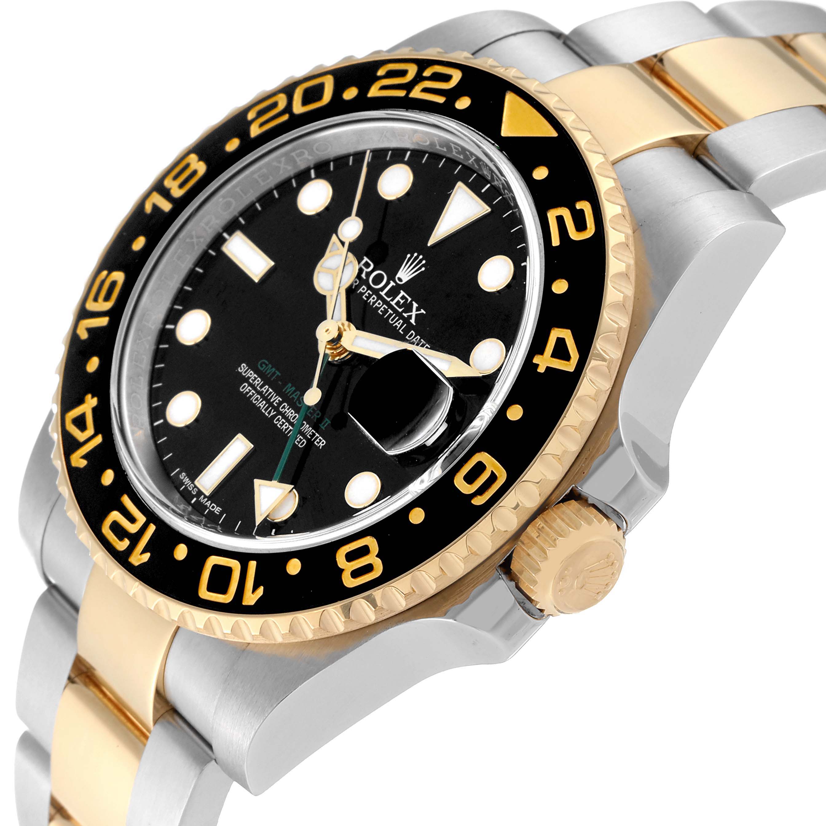 This image shows a side angle of the Rolex GMT-Master 116713 Men's Steel and Gold (two tone) Black Dial 116713 Men's Steel and Gold (two tone) Black Dial watch, highlighting the bezel, crown, and part of the strap.