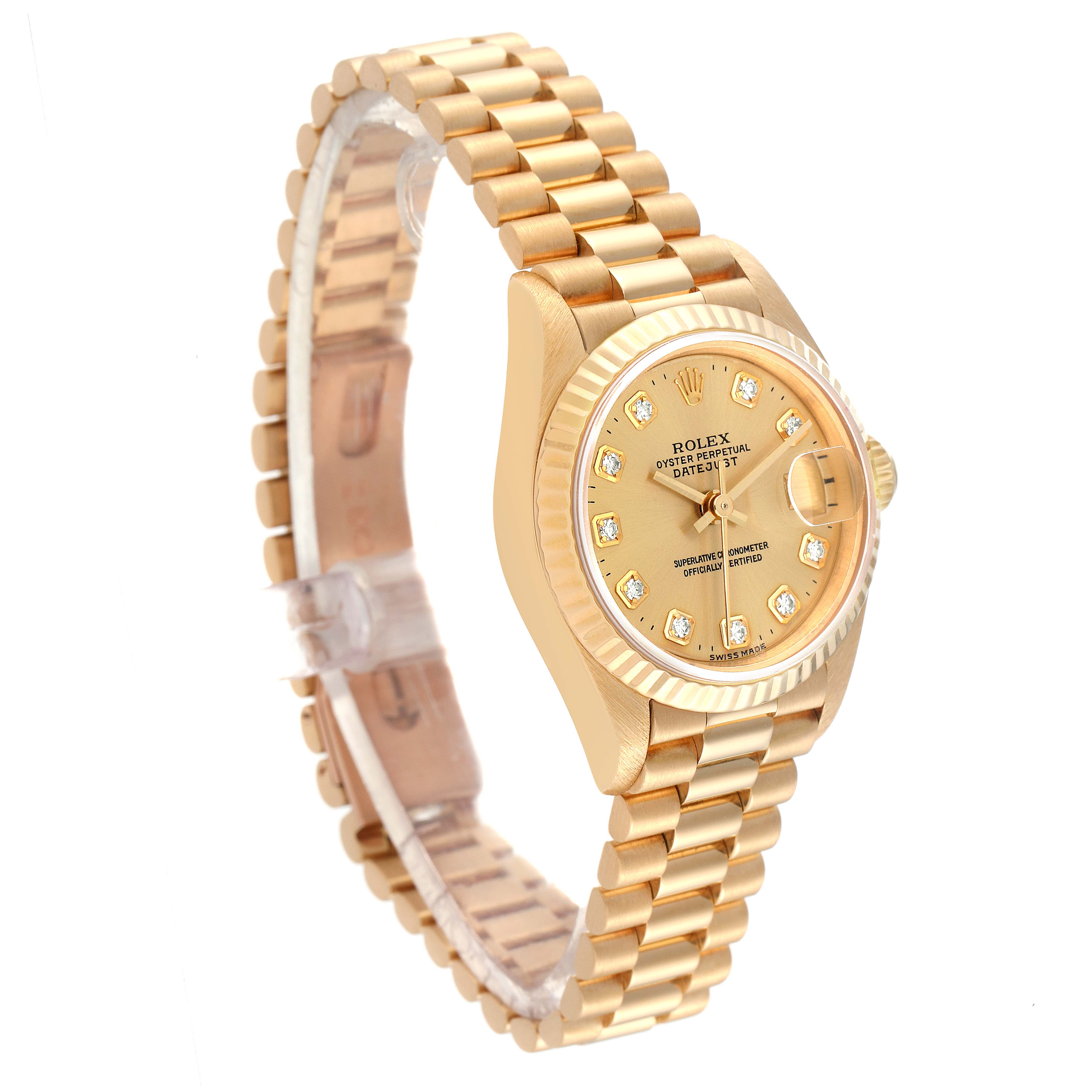 The image shows a side view of a gold Rolex President 69178 Women
s Yellow Gold Champagne Dial 69178 Women
s Yellow Gold Champagne Dial model watch, highlighting its bracelet, dial, and fluted bezel.