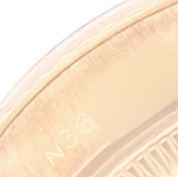 This image shows a close-up angle of the bezel on a Rolex President 69178 Women
s Yellow Gold Champagne Dial 69178 Women
s Yellow Gold Champagne Dial model watch.