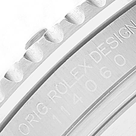 This image shows a close-up of the bezel and engravings on a Rolex Submariner 114060 Men
s Stainless Steel Black Dial 114060 Men
s Stainless Steel Black Dial watch, highlighting the model and branding details.