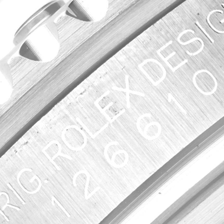 This image shows a close-up view of the engraved model number on the side of a Rolex Submariner 126610LN Men
s Stainless Steel Black Dial 126610LN Men
s Stainless Steel Black Dial watch case.