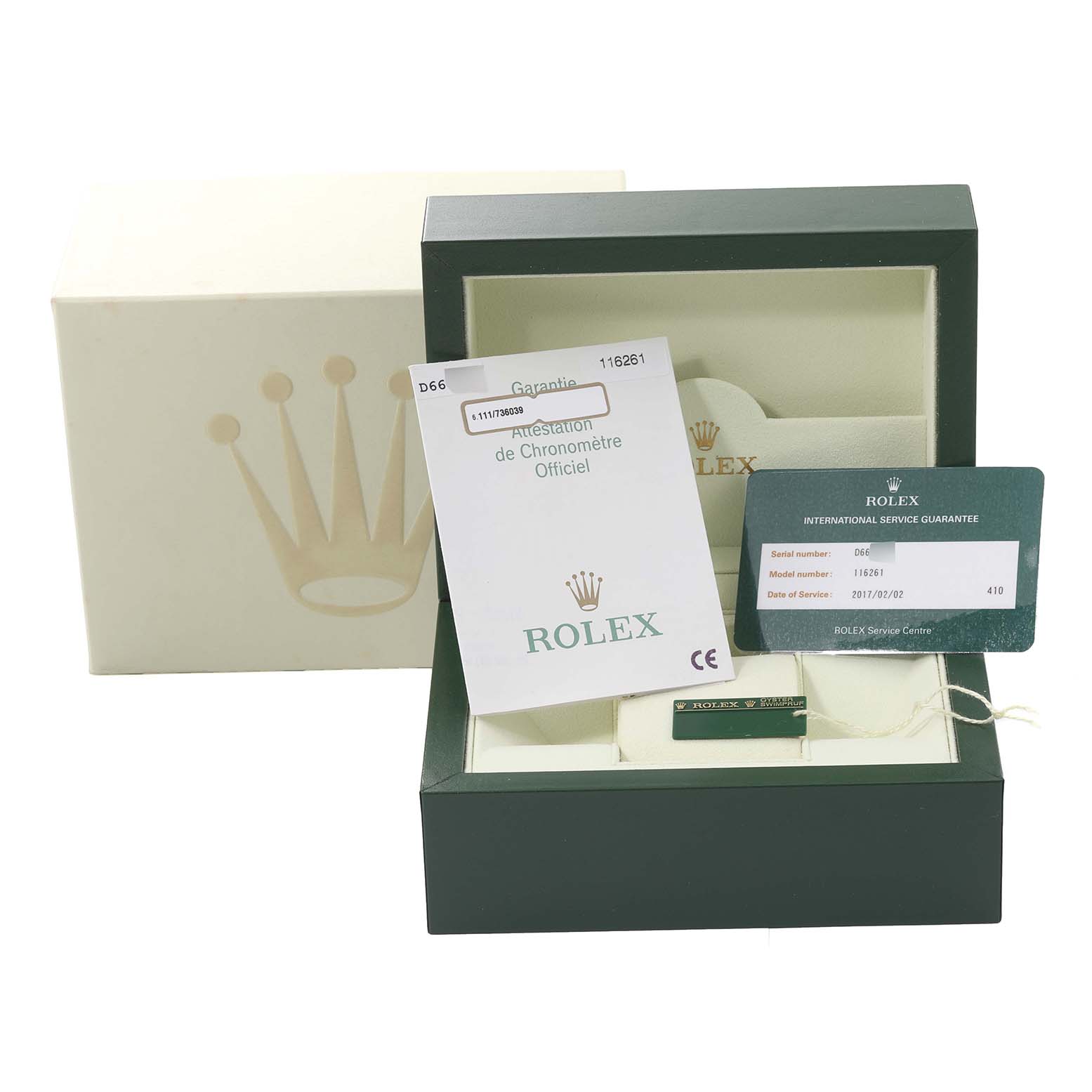 The image shows the packaging, certification, and warranty cards for the Rolex Turn-o-Graph 116261 Men's Steel and Gold (two tone) Black Dial 116261 Men's Steel and Gold (two tone) Black Dial model, displayed at an angle.