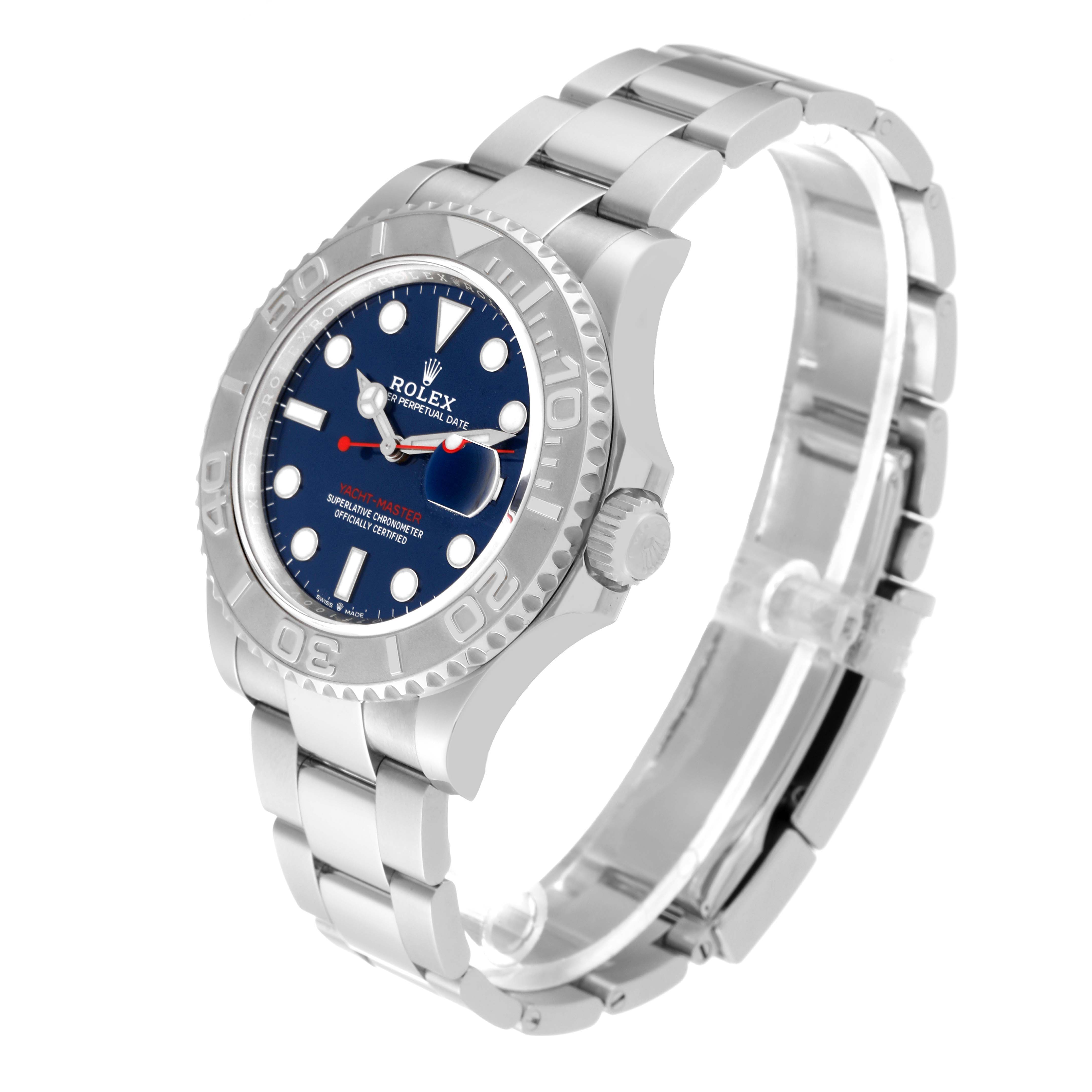 The Yacht-Master Rolex watch is shown at an angled side view, displaying its bezel, dial, bracelet, and crown.