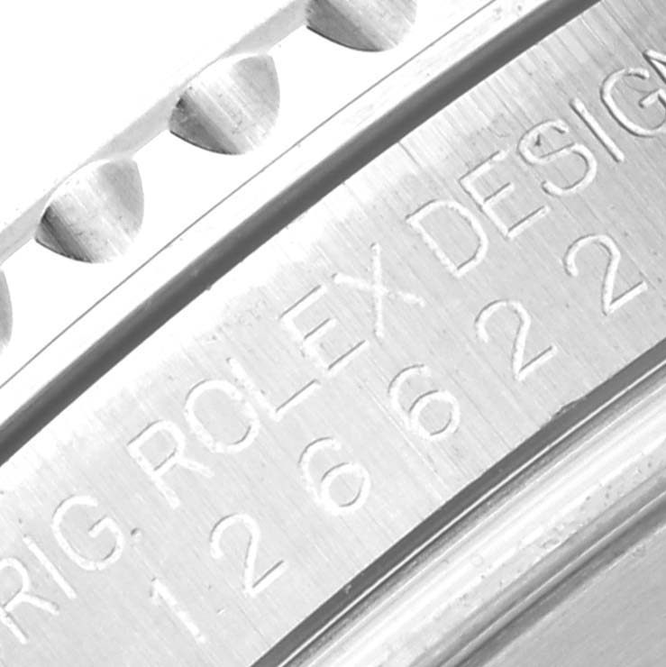 Close-up angle of the inscription on the bezel edge of a Rolex Yacht-Master 126622 Men's Stainless Steel Blue Dial 126622 Men's Stainless Steel Blue Dial watch.