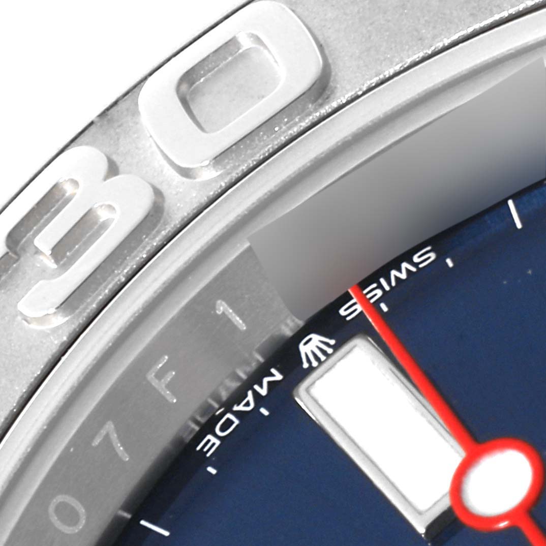 The close-up image of the Yacht-Master Rolex watch shows the bezel, part of the dial, and the "30" minute marker.