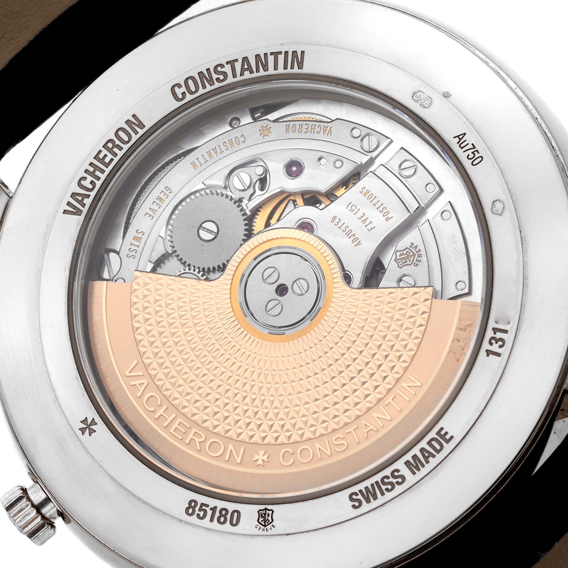The image shows the back view of a Vacheron Constantin Patrimony 85180 Men
s White Gold Silver Dial 85180 Men
s White Gold Silver Dial watch, revealing the intricate movement and rotor.
