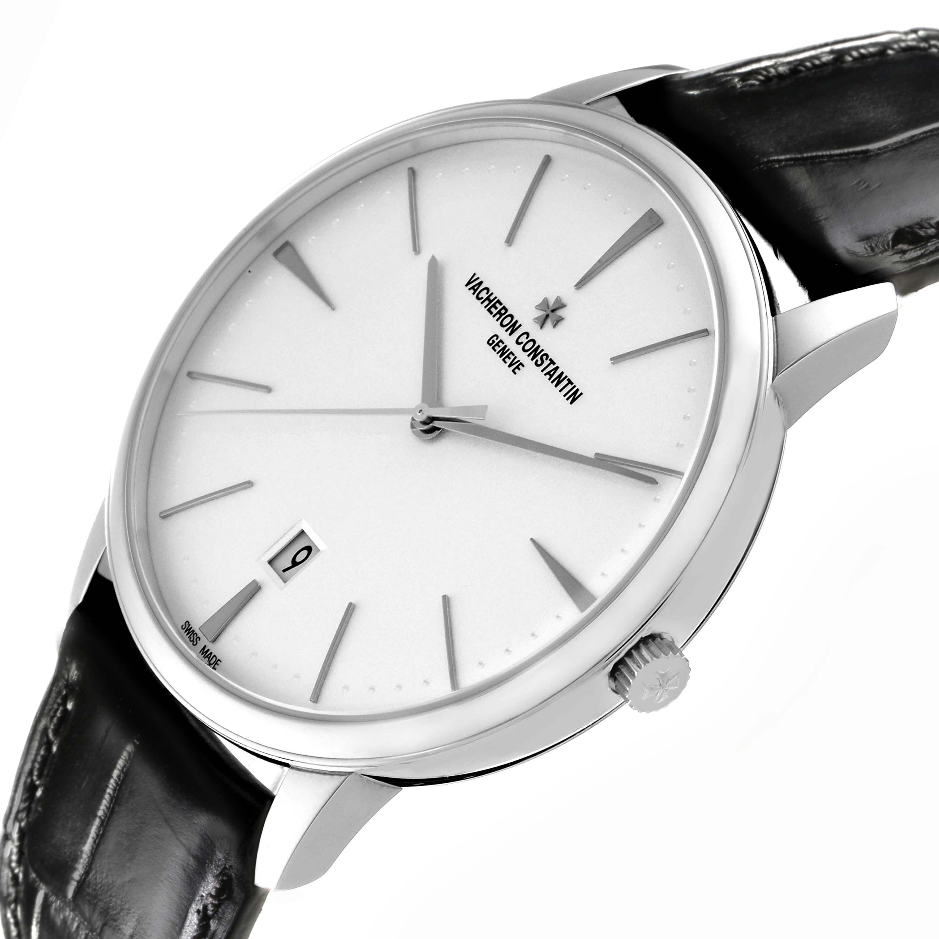 The Vacheron Constantin Patrimony 85180 Men
s White Gold Silver Dial 85180 Men
s White Gold Silver Dial watch is shown at an angled side view, highlighting the dial, hands, crown, and part of the leather strap.
