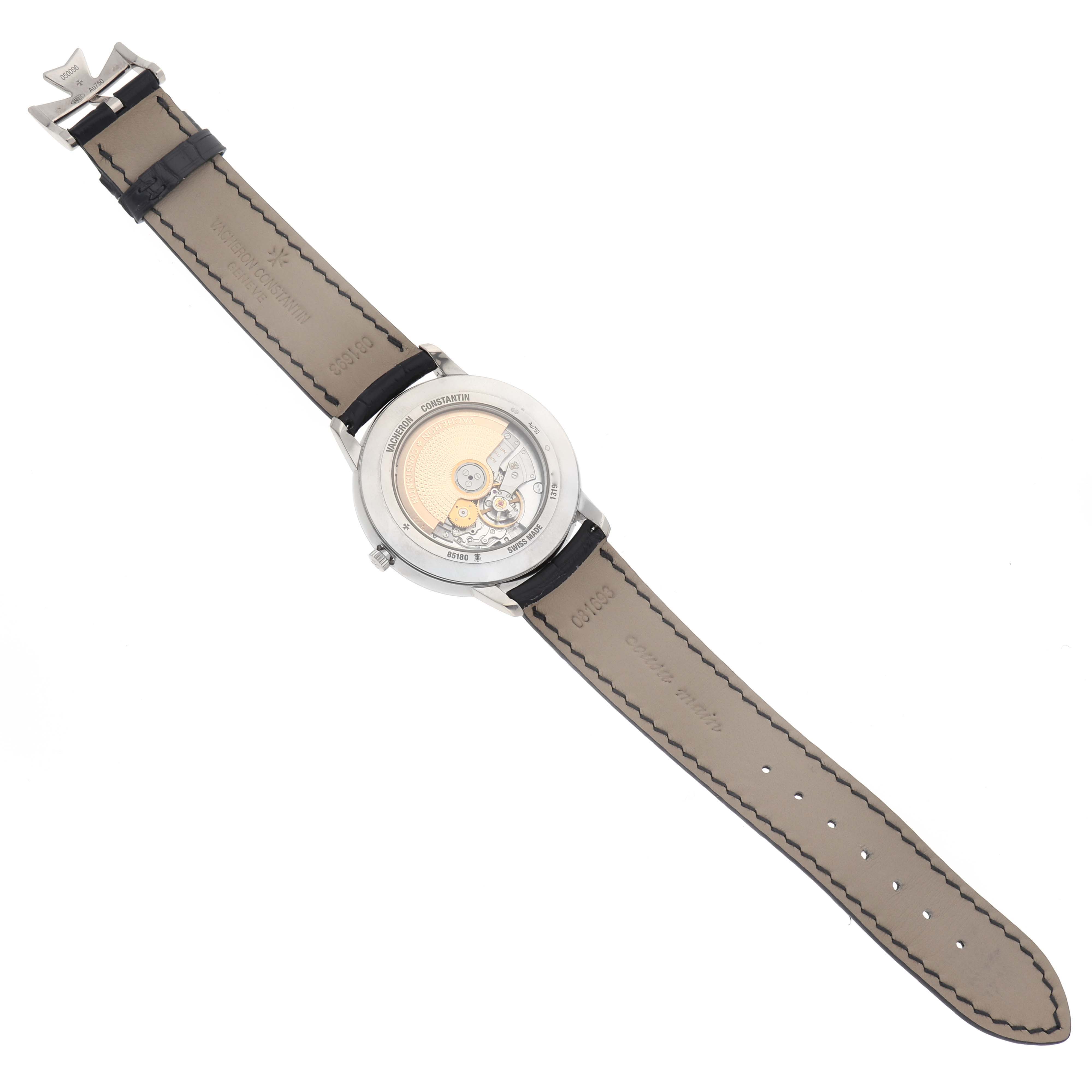 The image shows the back view of a Vacheron Constantin Patrimony 85180 Men
s White Gold Silver Dial 85180 Men
s White Gold Silver Dial watch, highlighting the open case back and movement.