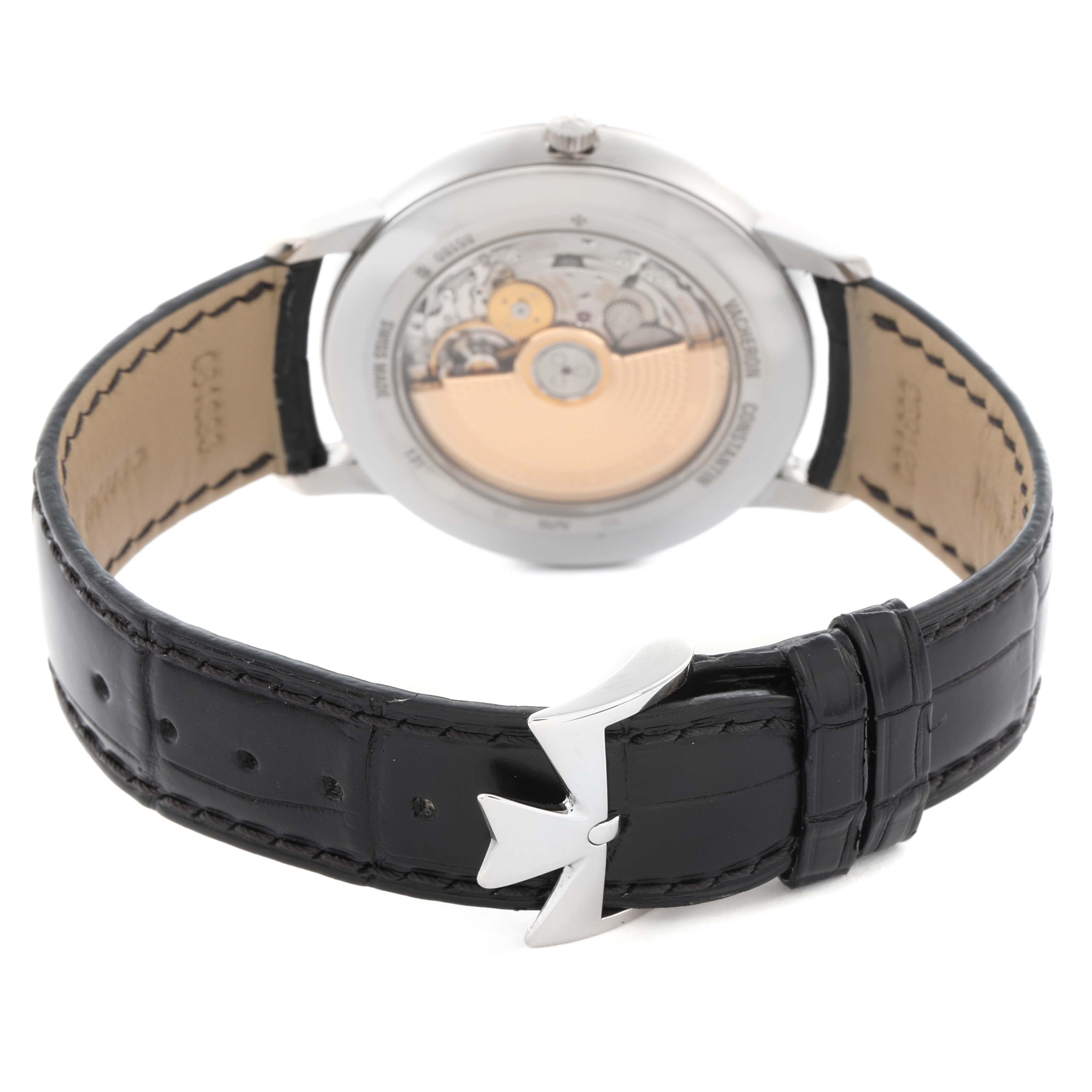 The Vacheron Constantin Patrimony 85180 Men
s White Gold Silver Dial 85180 Men
s White Gold Silver Dial watch is shown from the back, highlighting its transparent case back and leather strap with buckle.