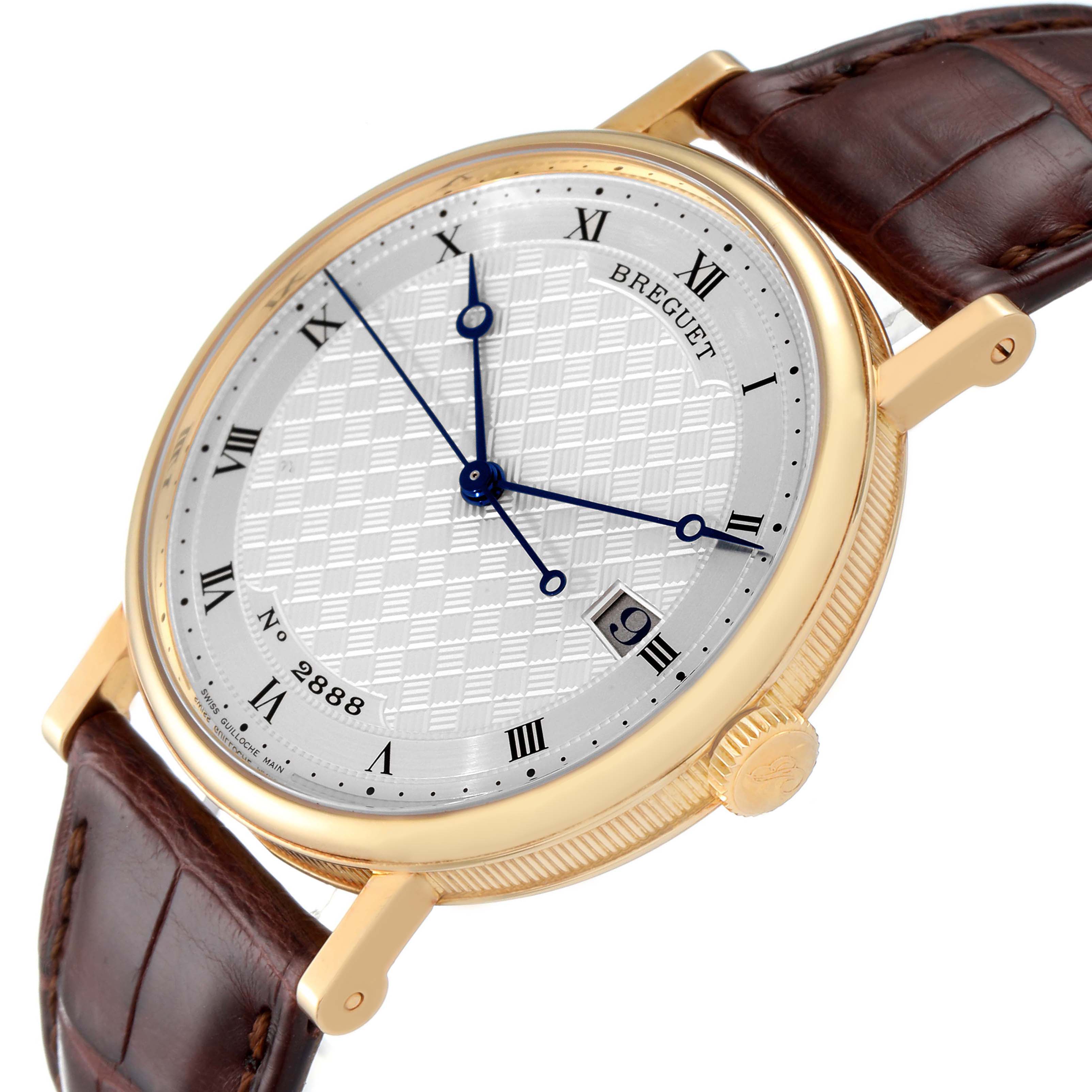 This image shows a close-up angle of the Breguet Classique 5177BA Men's Yellow Gold Silver Dial 5177BA Men's Yellow Gold Silver Dial watch, highlighting the dial, blue hands, date display, and brown leather strap.