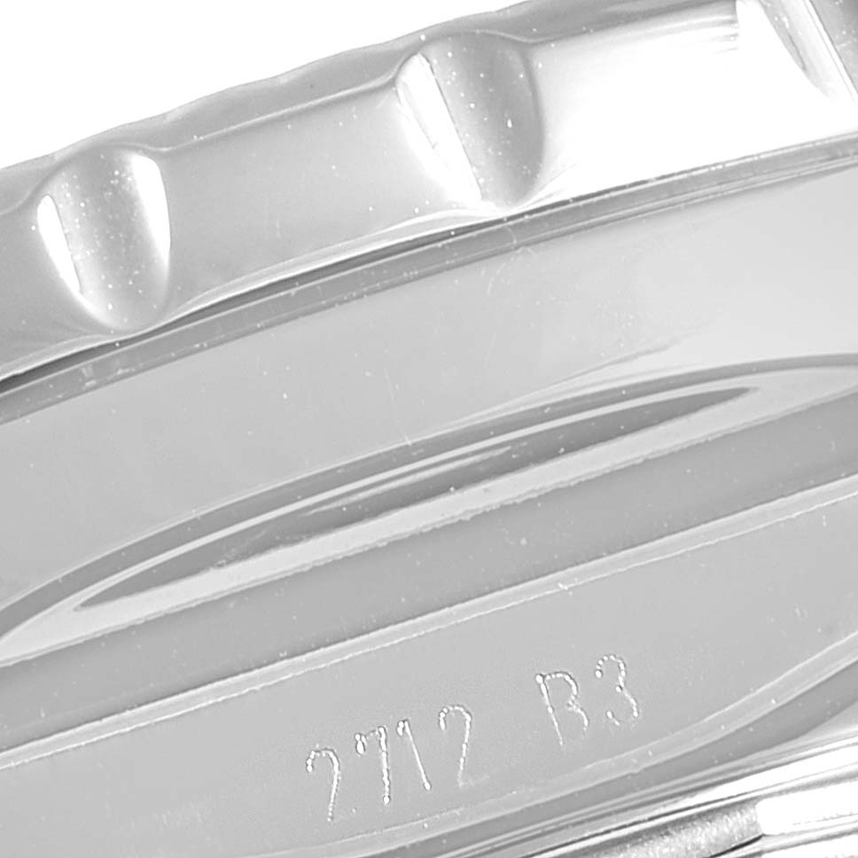 This image shows a close-up of the Breitling Bentley A13362 Men's Stainless Steel Black Dial A13362 Men's Stainless Steel Black Dial watch's bezel and part of the case with engraved markings.