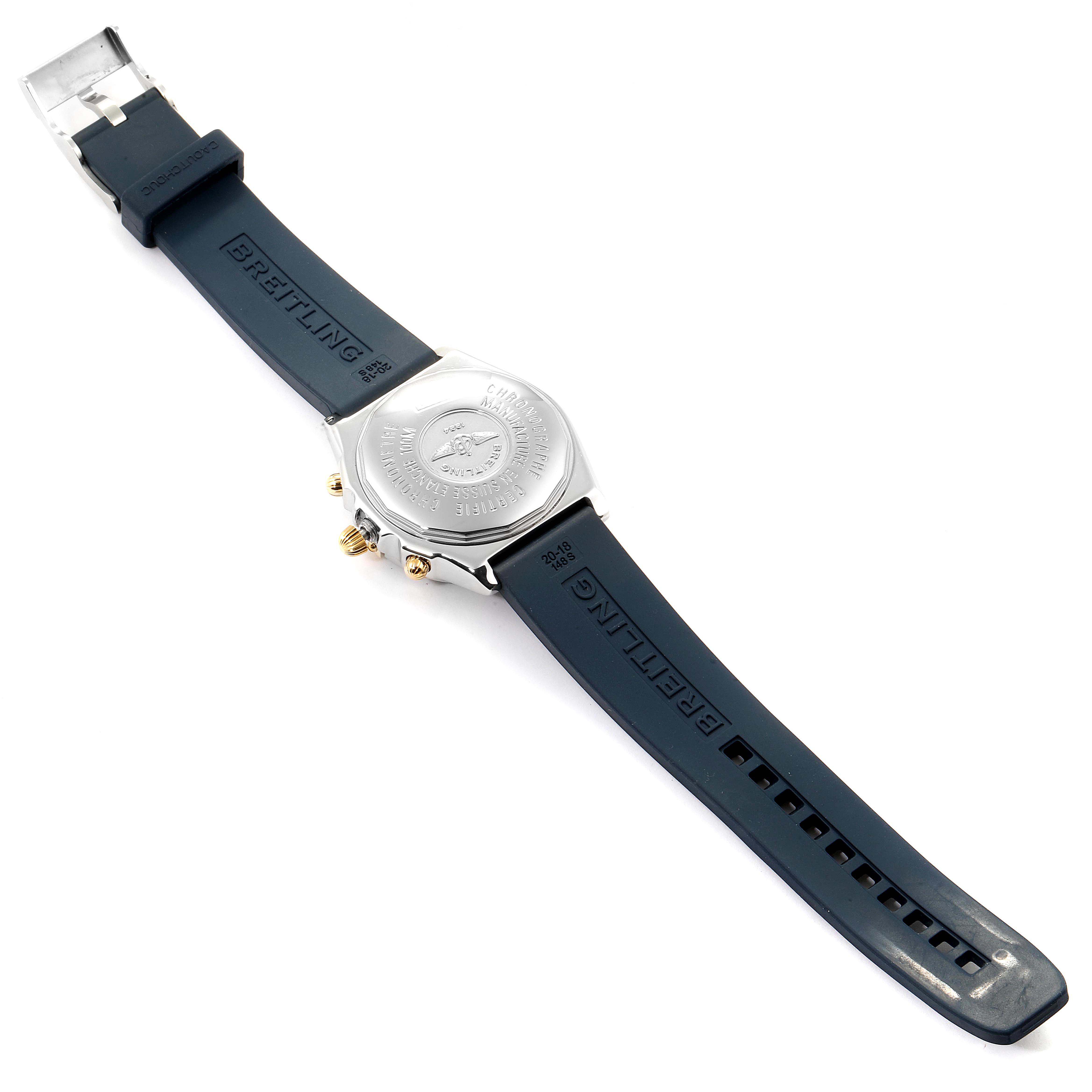 The image shows the back view of a Breitling Chronomat B13352 Men's Steel and Gold (two tone) White Dial B13352 Men's Steel and Gold (two tone) White Dial watch with a visible case back, buttons, and a blue rubber strap.