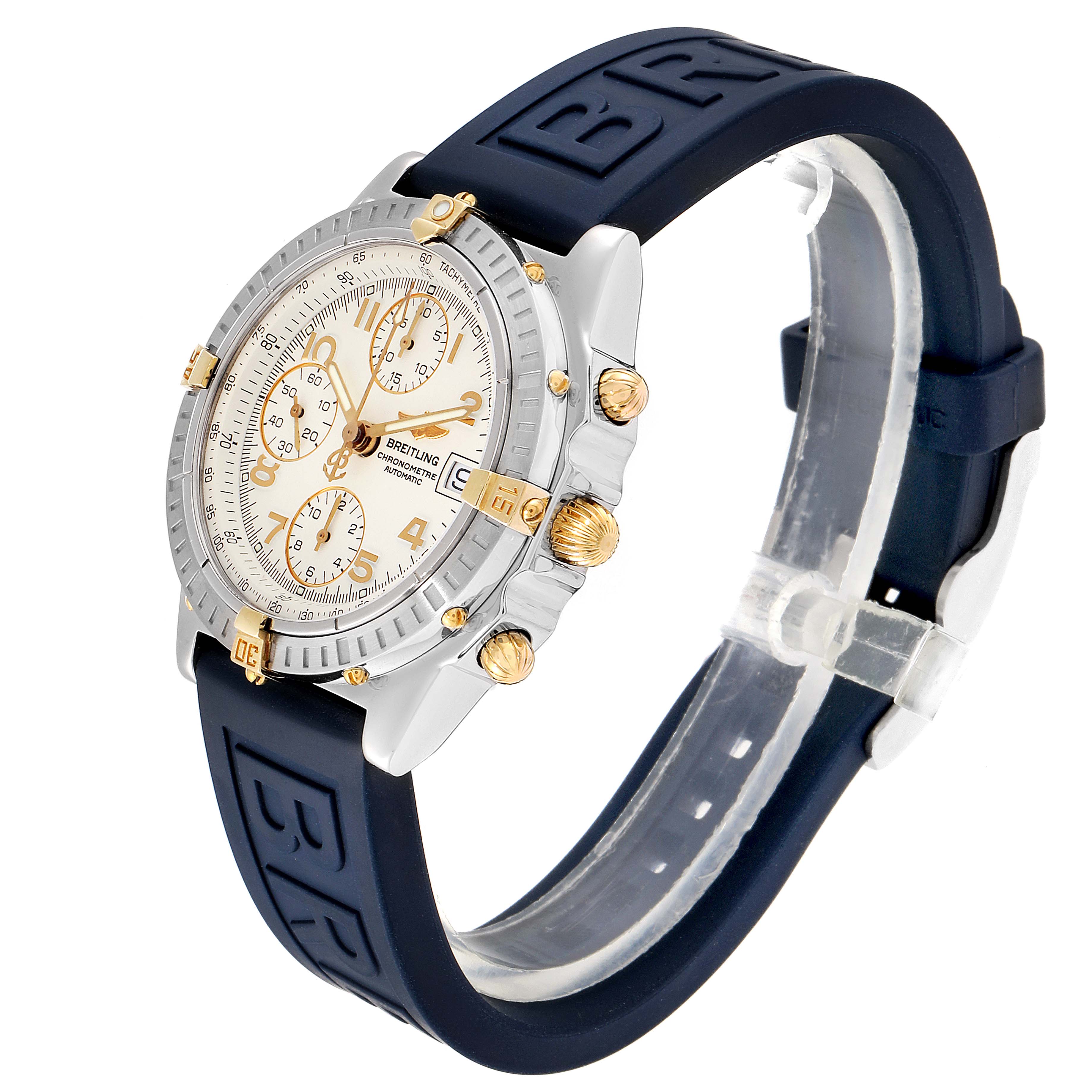 The Breitling Chronomat B13352 Men's Steel and Gold (two tone) White Dial B13352 Men's Steel and Gold (two tone) White Dial watch is shown from a side angle, displaying its face, bezel, pushers, crown, and strap.