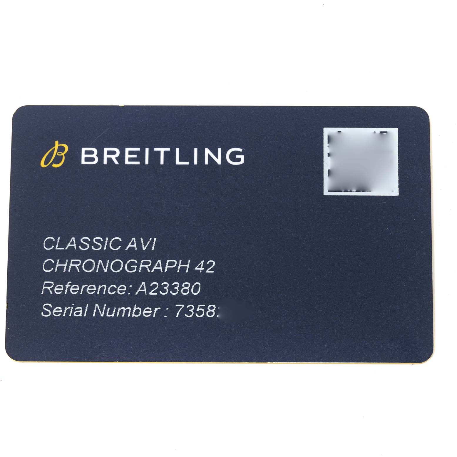 This image shows a Breitling Classic Avi Chronograph 42 reference card with reference number A23380 and a partially obscured serial number.