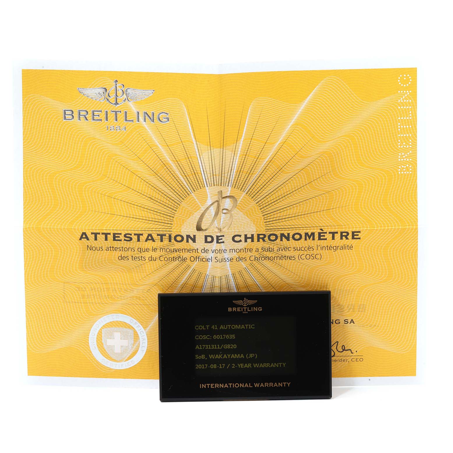 The image shows Chronometer Certification and International Warranty documentation for a Breitling Colt A17313 Men
s Stainless Steel White Dial A17313 Men
s Stainless Steel White Dial model watch.