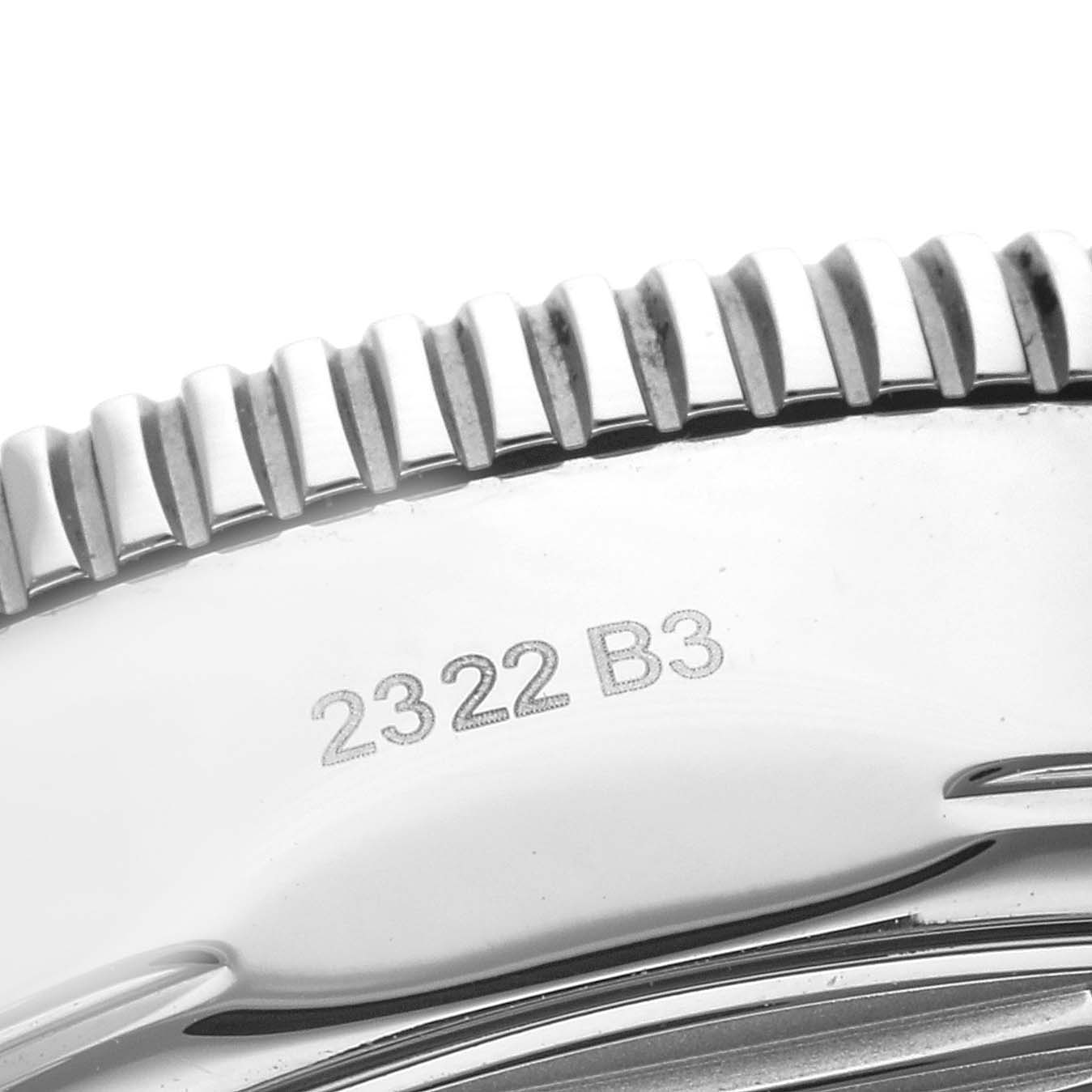 The image shows a close-up of the bezel and case side of a Breitling Superocean AB2010 Men's Stainless Steel Green Dial AB2010 Men's Stainless Steel Green Dial watch, including the engraving "2322 B3."