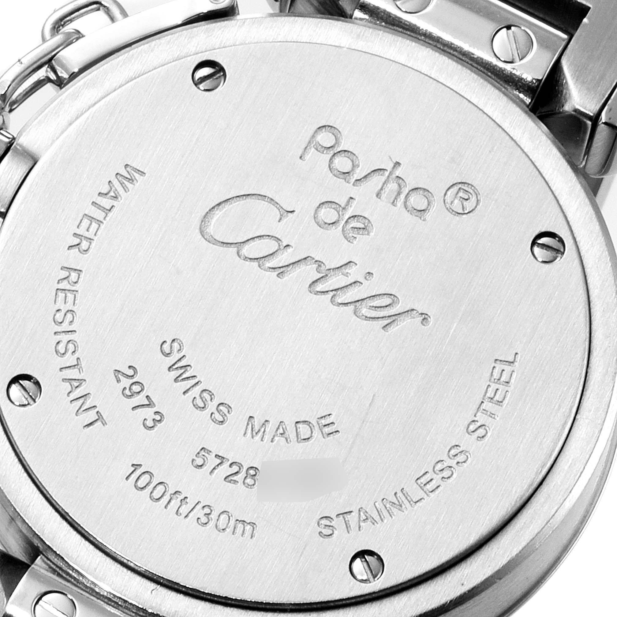 The image shows the back case of the Pasha de Cartier watch, featuring its inscriptions and screws.