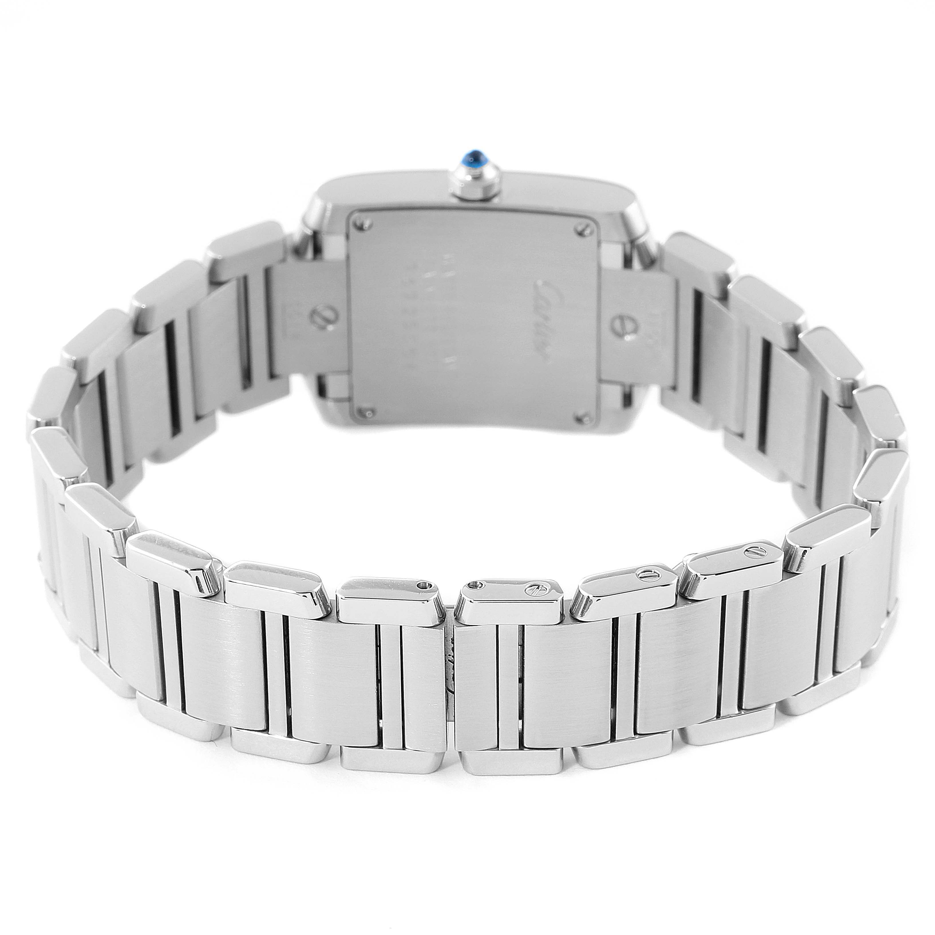 This image shows the back view of a Cartier Tank Française watch, highlighting its stainless steel bracelet and caseback.