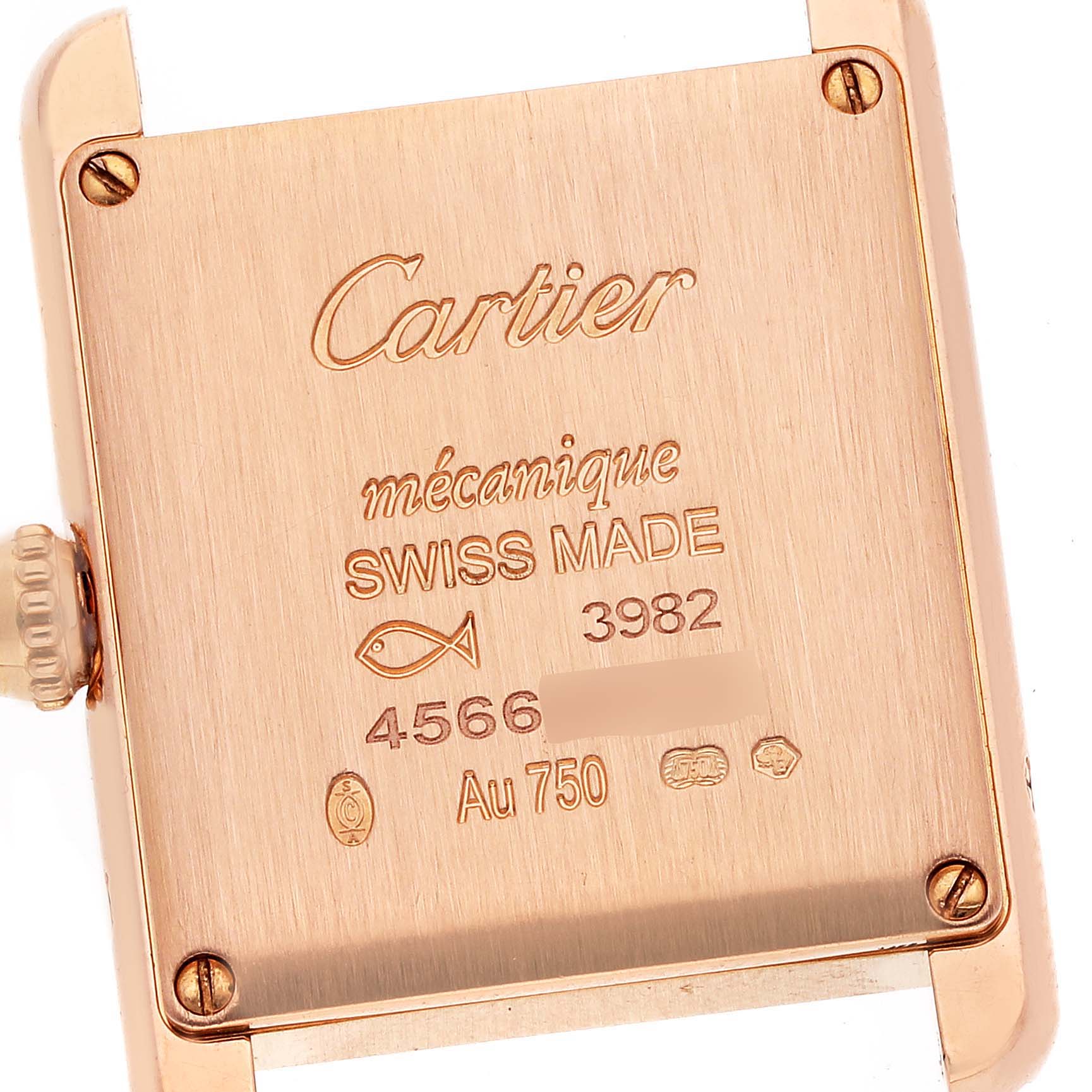 The image shows the back case of a Cartier Tank Louis WJTA0010 Women
s Rose Gold Silver Dial WJTA0010 Women
s Rose Gold Silver Dial watch, highlighting engravings and the winding crown.