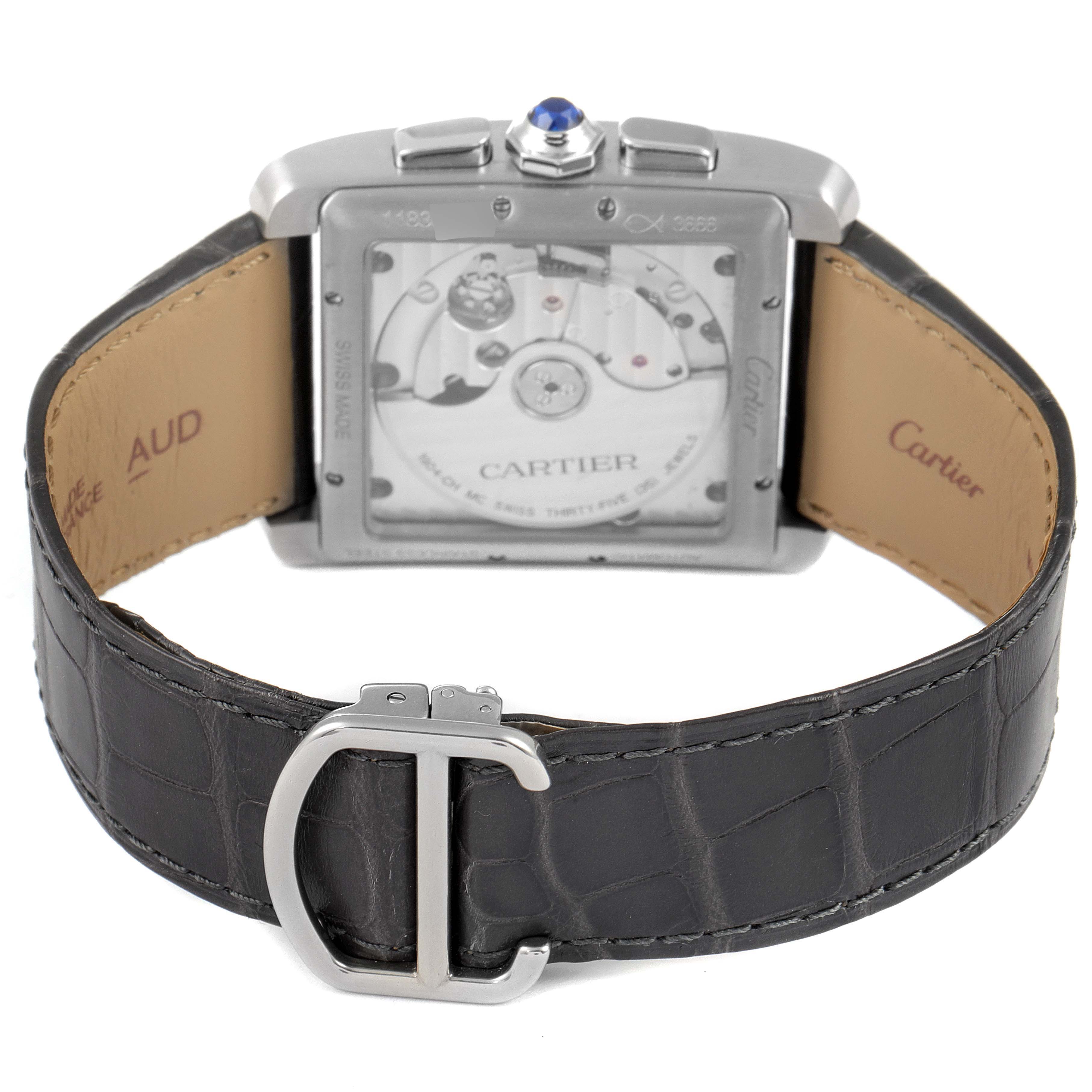 This image shows the back view of a Cartier Tank MC W5330008 Men's Stainless Steel Grey Dial W5330008 Men's Stainless Steel Grey Dial watch, highlighting the movement and the leather strap with buckle.