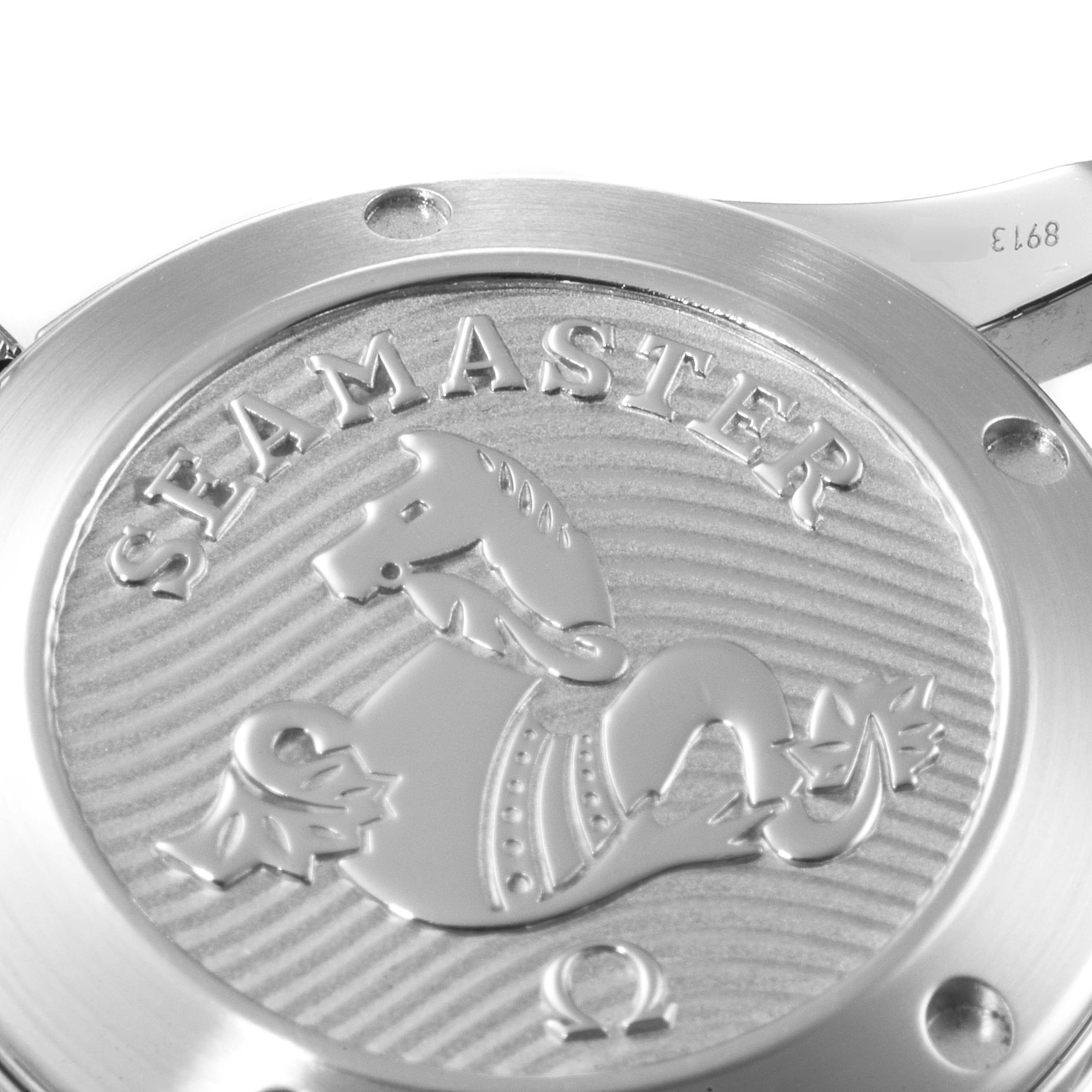 This image shows a close-up of the case back of an Omega Seamaster 212.30.36.20.01.002 Men
s Stainless Steel Black Dial 212.30.36.20.01.002 Men
s Stainless Steel Black Dial watch, featuring its engraved logo.