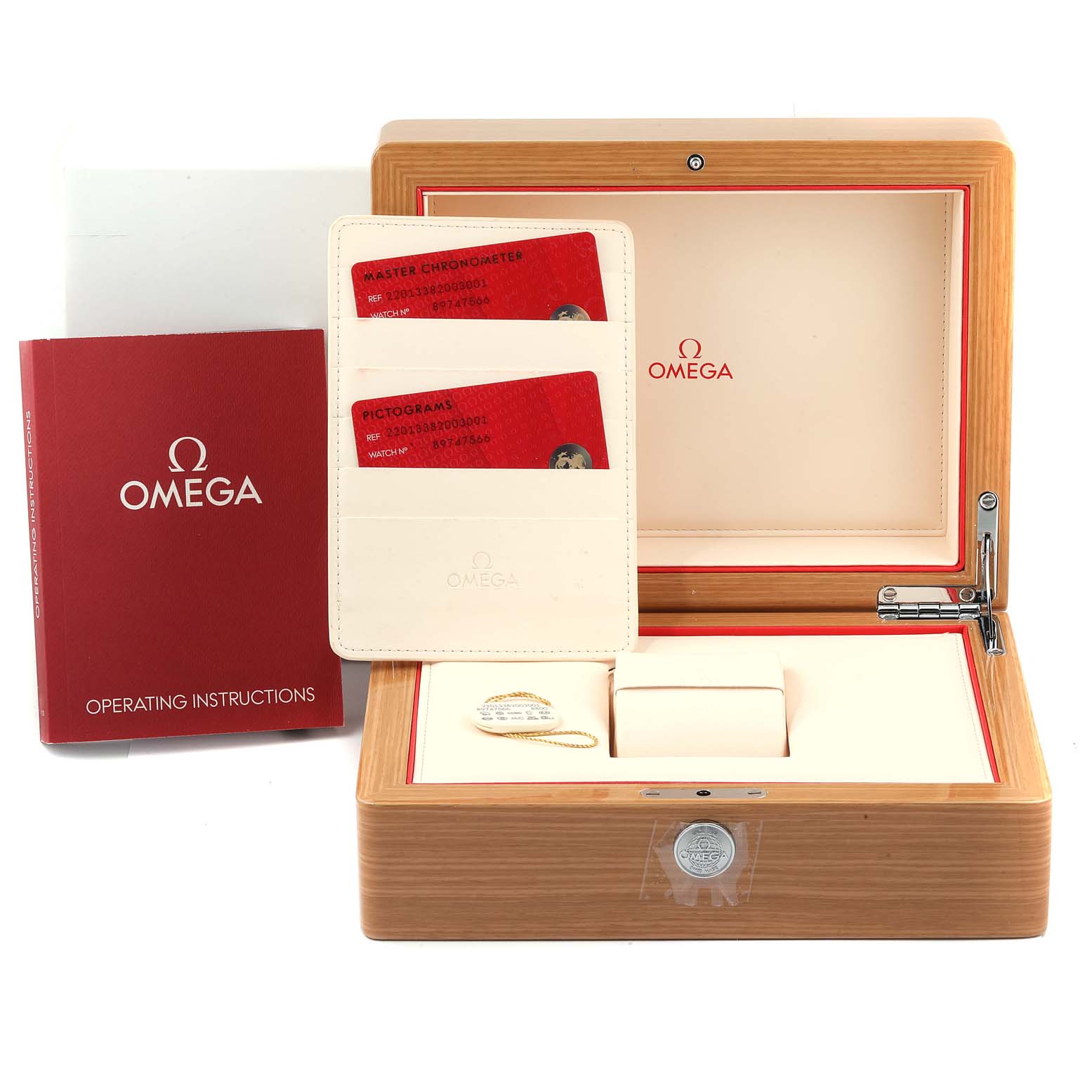 This image shows the packaging of an Omega Aqua Terra 220.13.38.20.03.001 Men's Stainless Steel Blue Dial 220.13.38.20.03.001 Men's Stainless Steel Blue Dial watch, including the wooden box, operating instructions, and warranty cards.