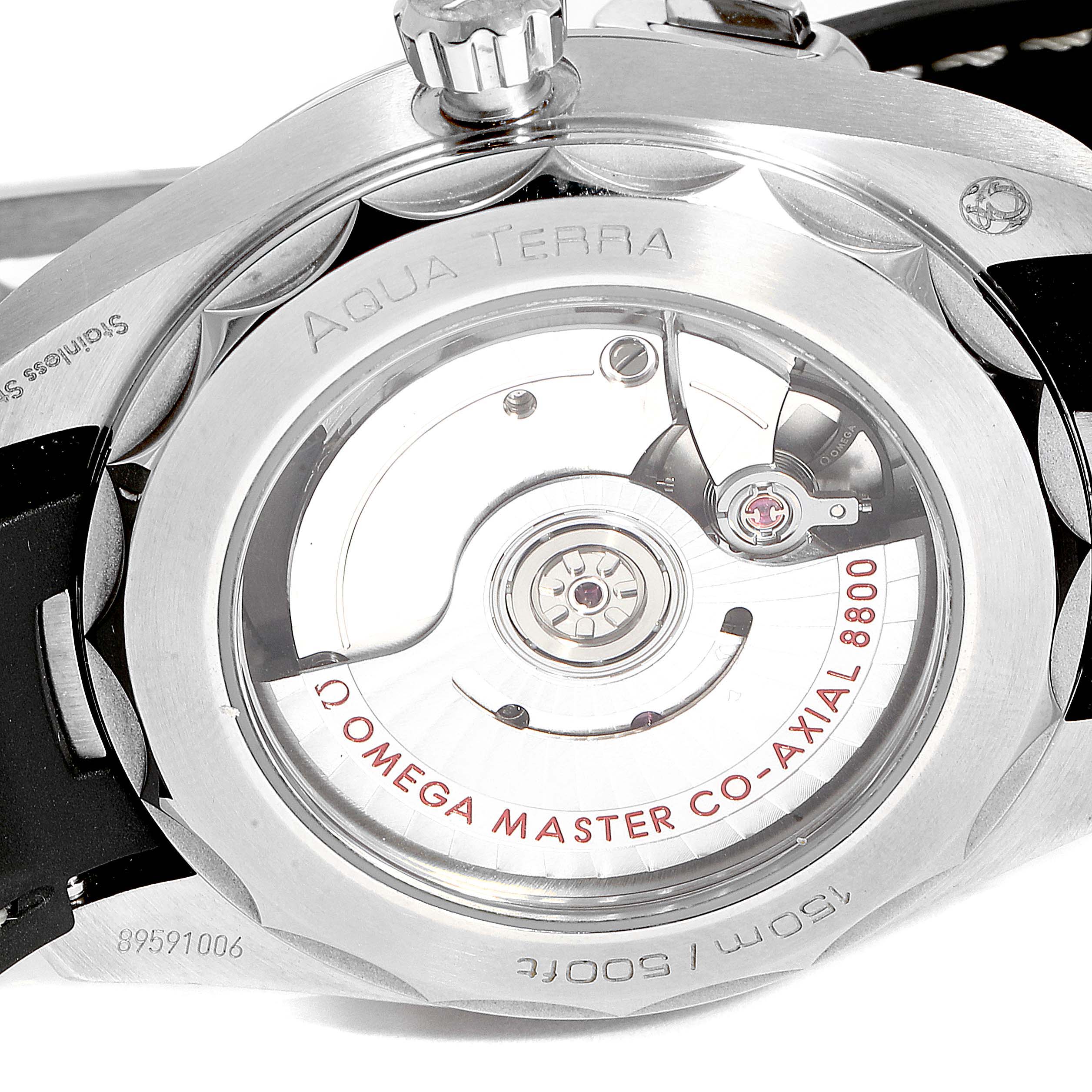 The image shows the back view of the Omega Aqua Terra 220.12.38.20.02.001 Men
s Stainless Steel Silver Dial 220.12.38.20.02.001 Men
s Stainless Steel Silver Dial watch, focusing on the co-axial 8800 movement through the transparent case back.