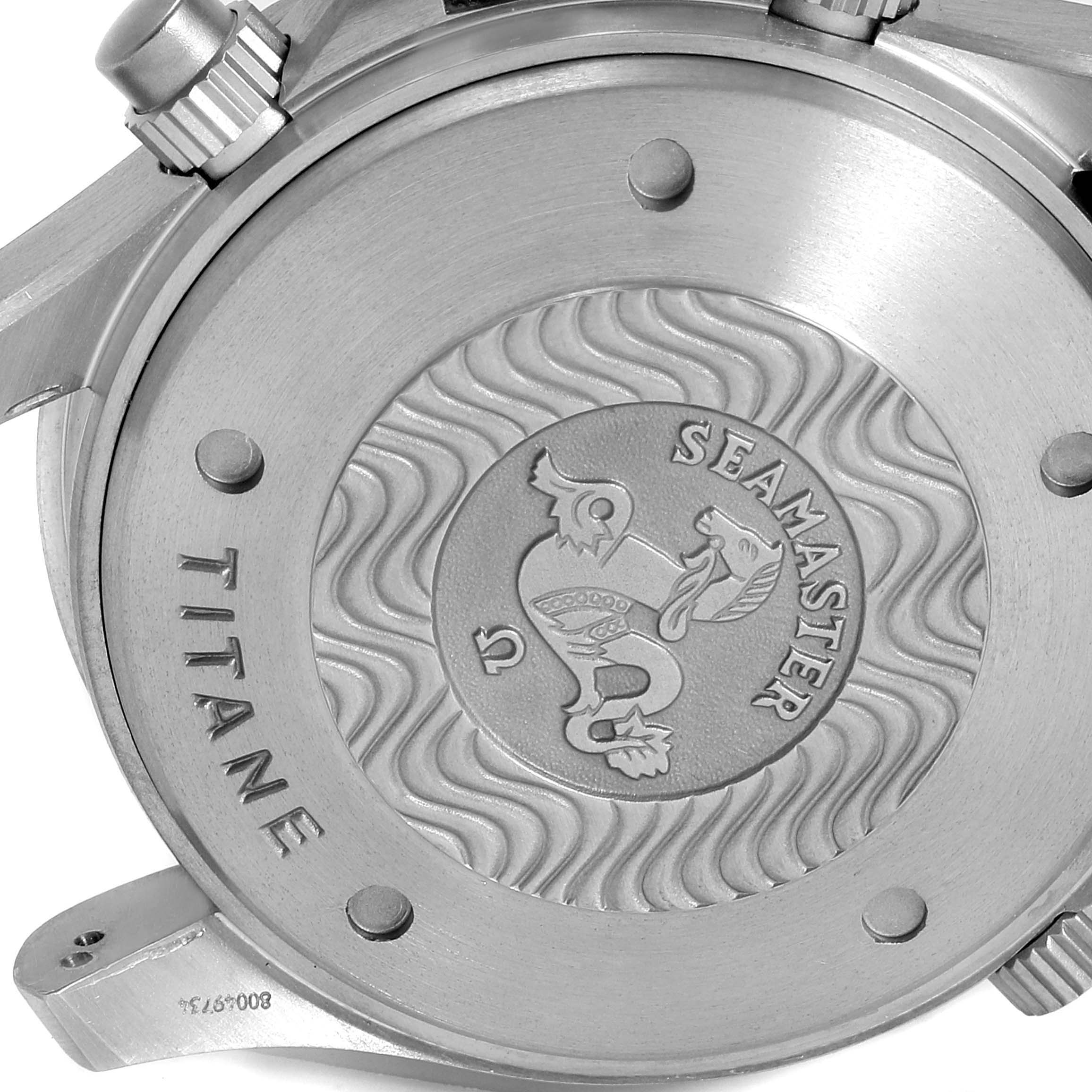 This image shows the Omega Seamaster 2298.80.00 Men
s Titanium Blue Dial 2298.80.00 Men
s Titanium Blue Dial
s case back, featuring engraved branding and a decorative emblem.