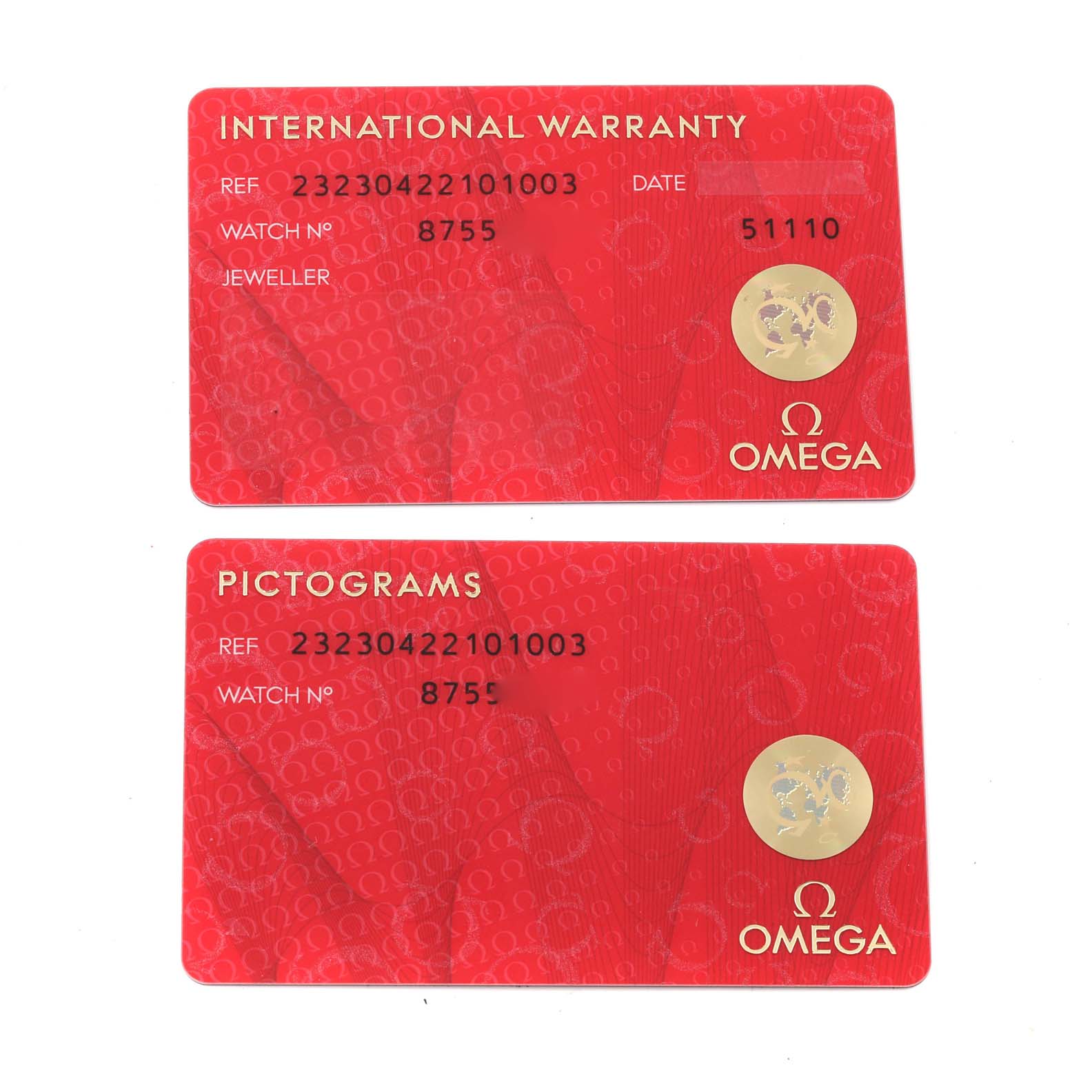 The image shows the international warranty and pictograms cards for the Omega Planet Ocean 232.30.42.21.01.003 Men
s Stainless Steel Black Dial 232.30.42.21.01.003 Men
s Stainless Steel Black Dial watch, photographed from above.