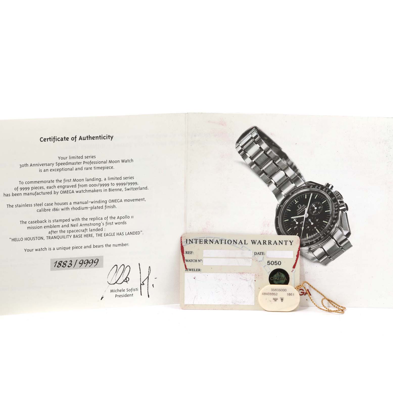 The image shows an Omega Speedmaster 3560.50.00 Men's Stainless Steel Black Dial 3560.50.00 Men's Stainless Steel Black Dial watch, certificate of authenticity, and international warranty card, all presented flat.