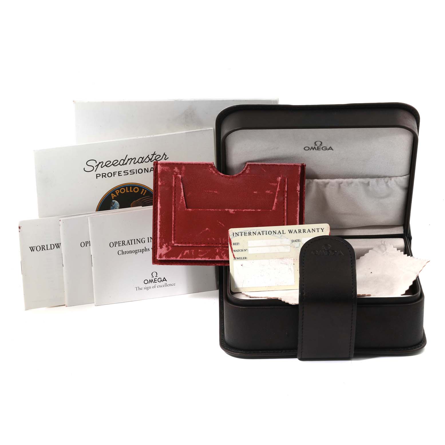 The image shows an Omega Speedmaster 3560.50.00 Men's Stainless Steel Black Dial 3560.50.00 Men's Stainless Steel Black Dial watch box, warranty card, manuals, and an Apollo 11 patch laid out.
