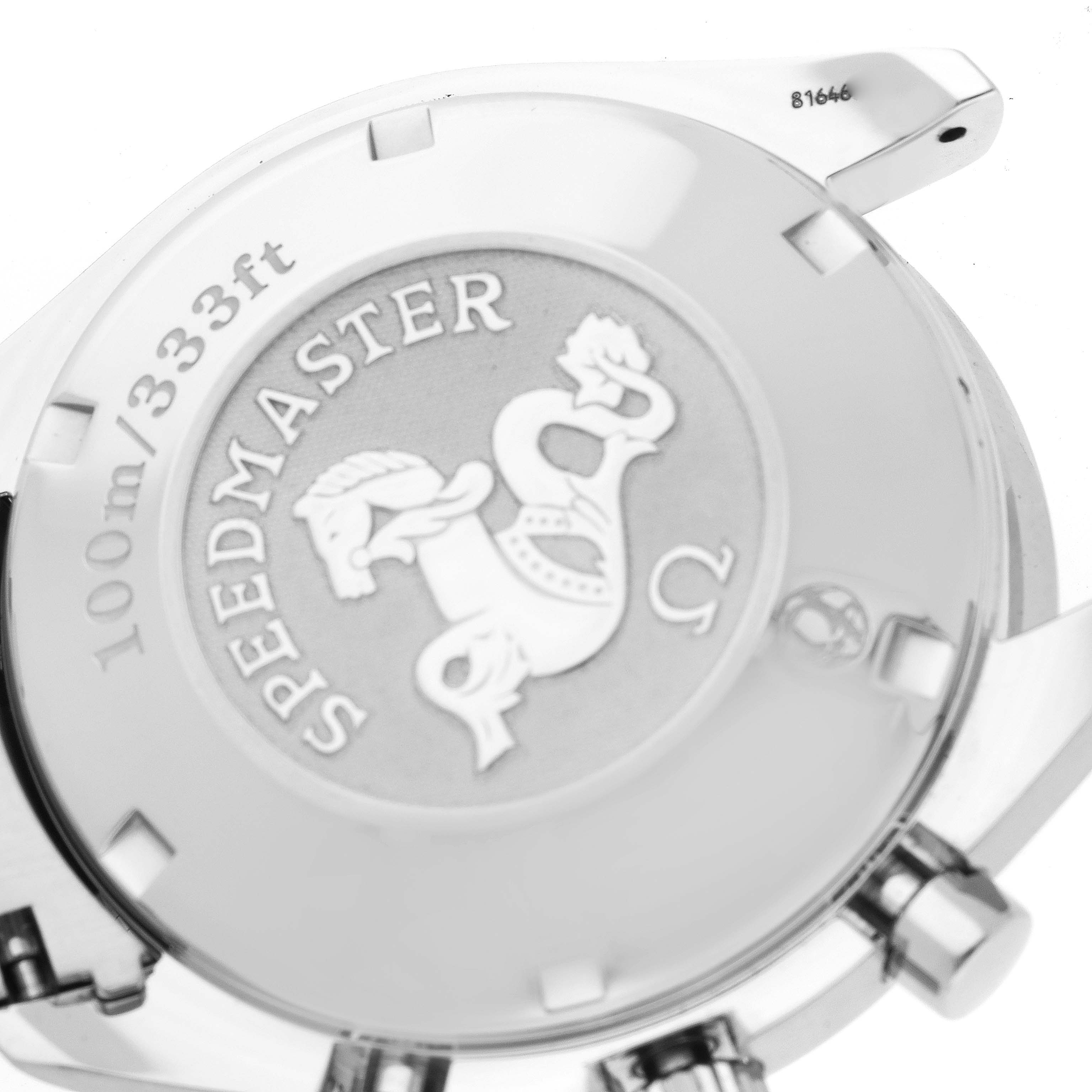 The image shows the case back and crown of an Omega Speedmaster 3212.80.00 Men
s Stainless Steel Blue Dial 3212.80.00 Men
s Stainless Steel Blue Dial watch, highlighting the engraved logo and depth rating.