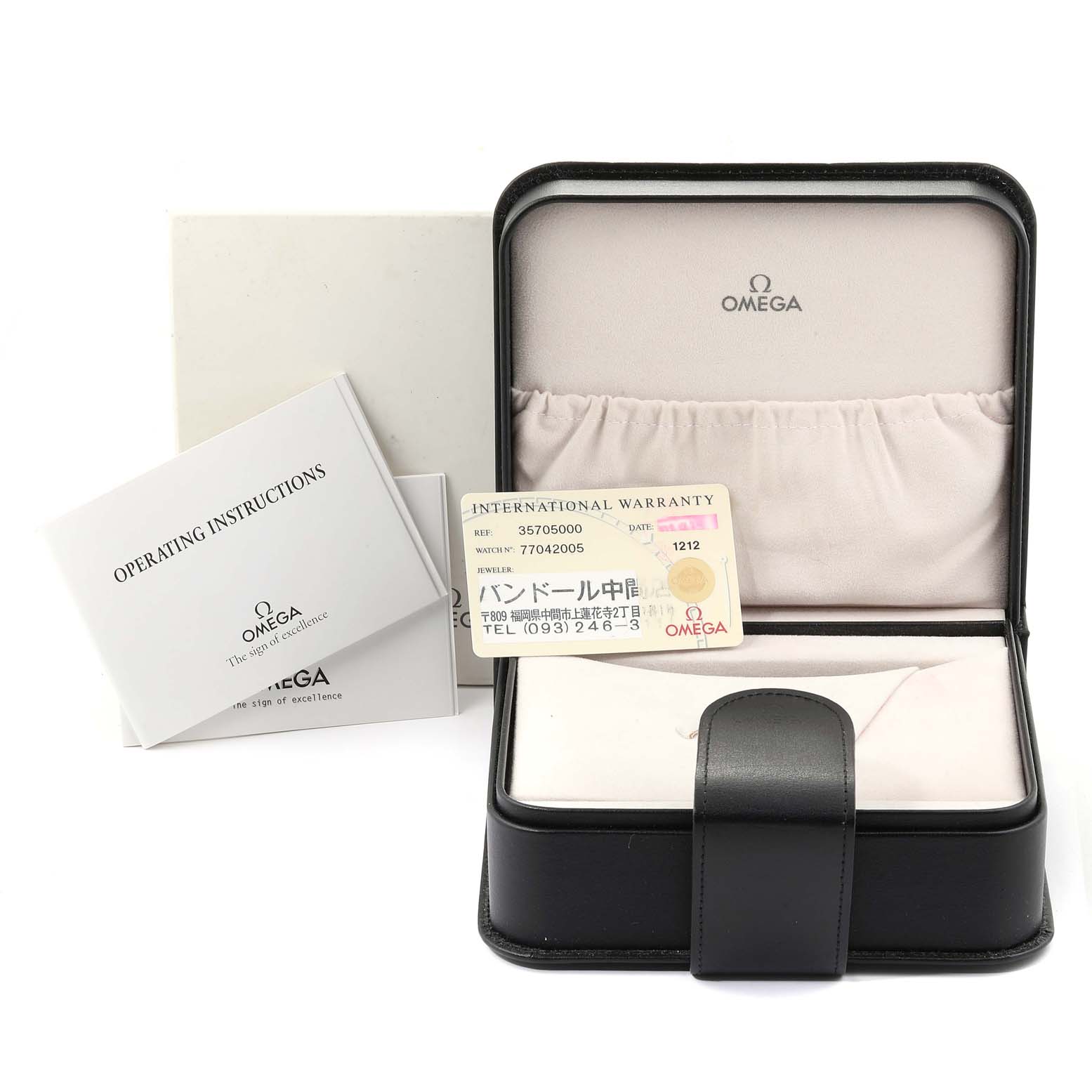 The image shows the box, operating instructions, and international warranty card for an Omega Speedmaster 3570.50.00 Men
s Stainless Steel Black Dial 3570.50.00 Men
s Stainless Steel Black Dial watch.