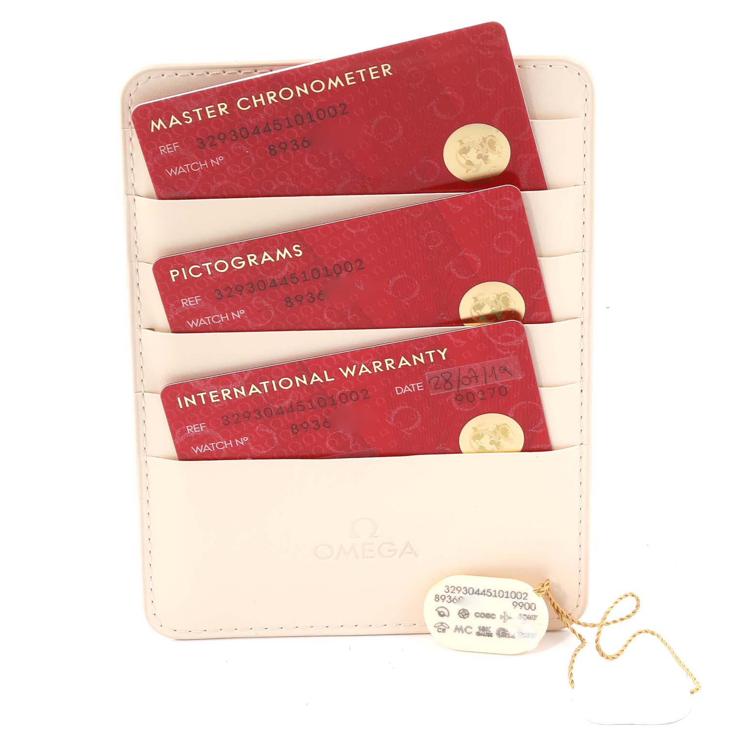 The image shows Omega Speedmaster 329.30.44.51.01.002 Men
s Stainless Steel Black Dial 329.30.44.51.01.002 Men
s Stainless Steel Black Dial watch accessories, including a cardholder with three red cards and a white tag with gold string.