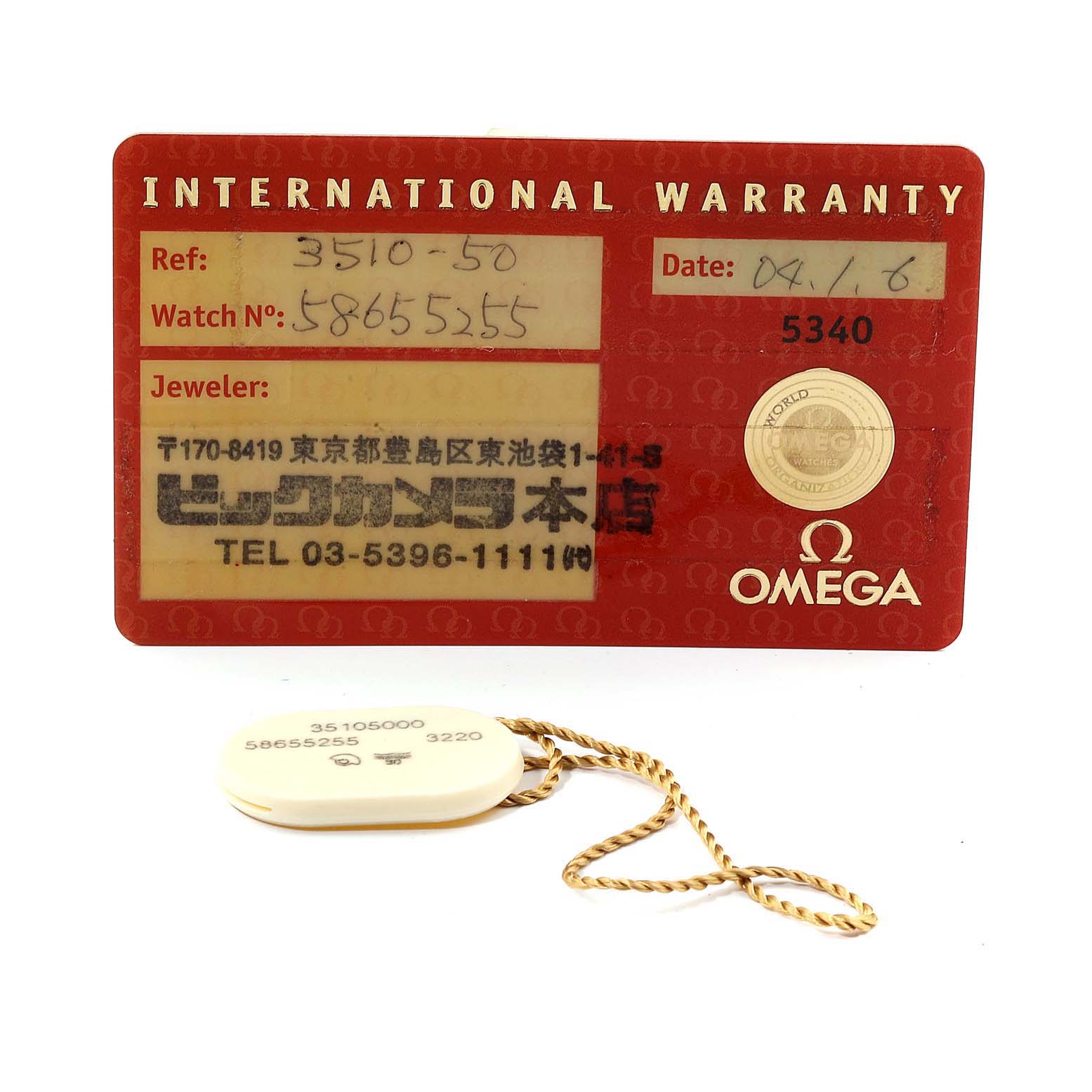 The image shows the international warranty card and a tag for the Omega Speedmaster 3510.50.00 Men
s Stainless Steel Black Dial 3510.50.00 Men
s Stainless Steel Black Dial watch.