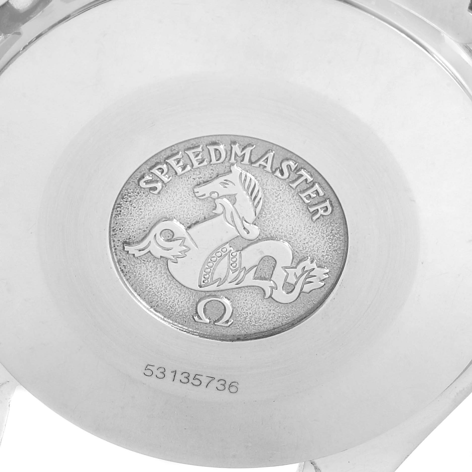 The image shows the case back of an Omega Speedmaster 3510.50.00 Men
s Stainless Steel Black Dial 3510.50.00 Men
s Stainless Steel Black Dial watch featuring the engraved logo and serial number.