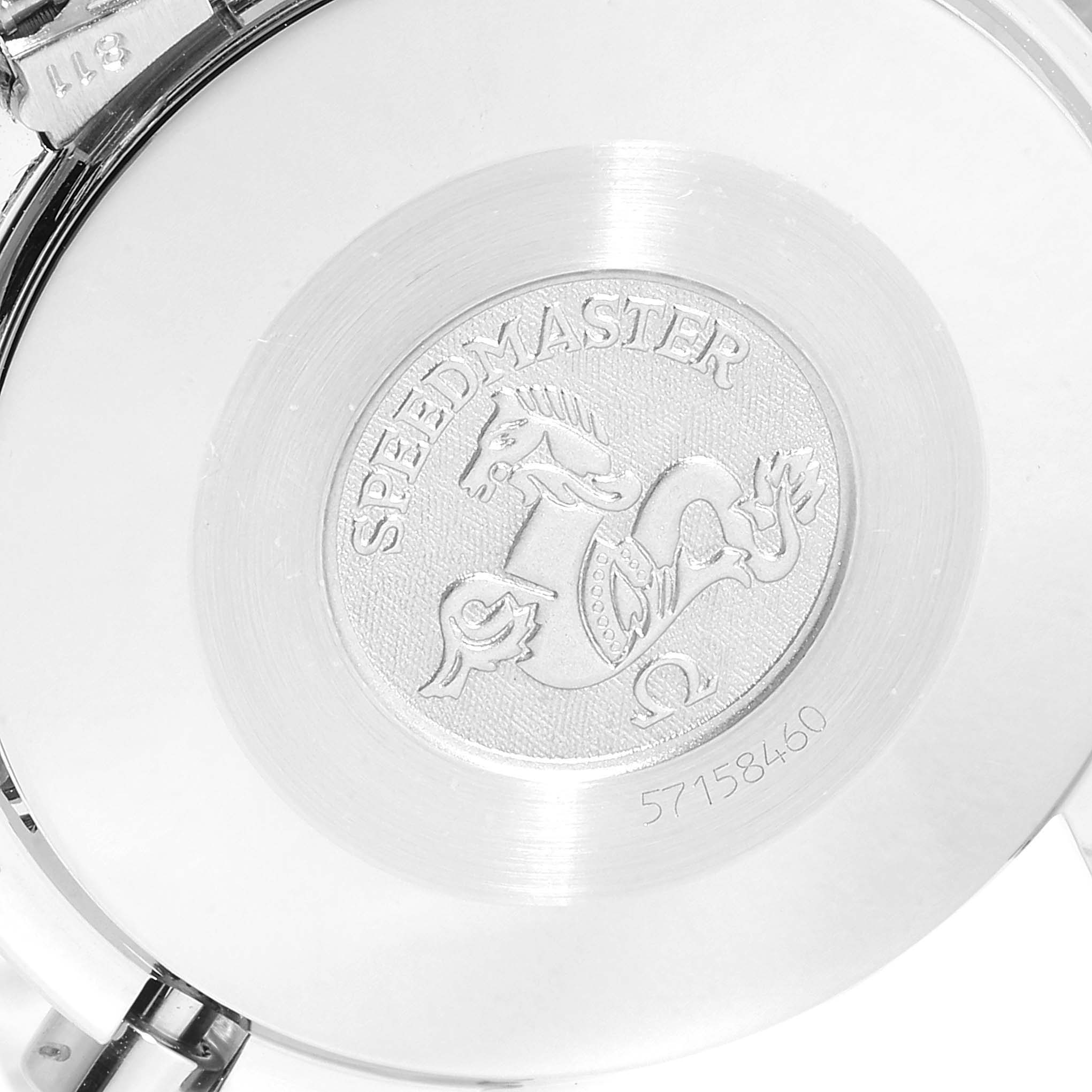 The image shows the case back of an Omega Speedmaster 3510.50.00 Men
s Stainless Steel Black Dial 3510.50.00 Men
s Stainless Steel Black Dial watch with its engraved logo and serial number.