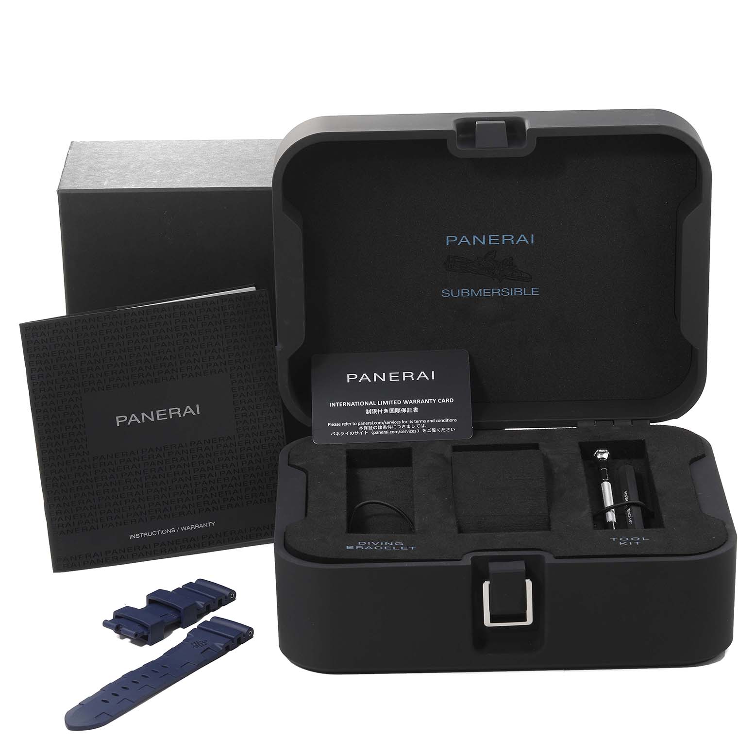 The Panerai Submersible PAM01289 Men
s Stainless Steel Blue Dial PAM01289 Men
s Stainless Steel Blue Dial watch box set includes a warranty card, instruction book, extra straps, and tools seen from a front angle.