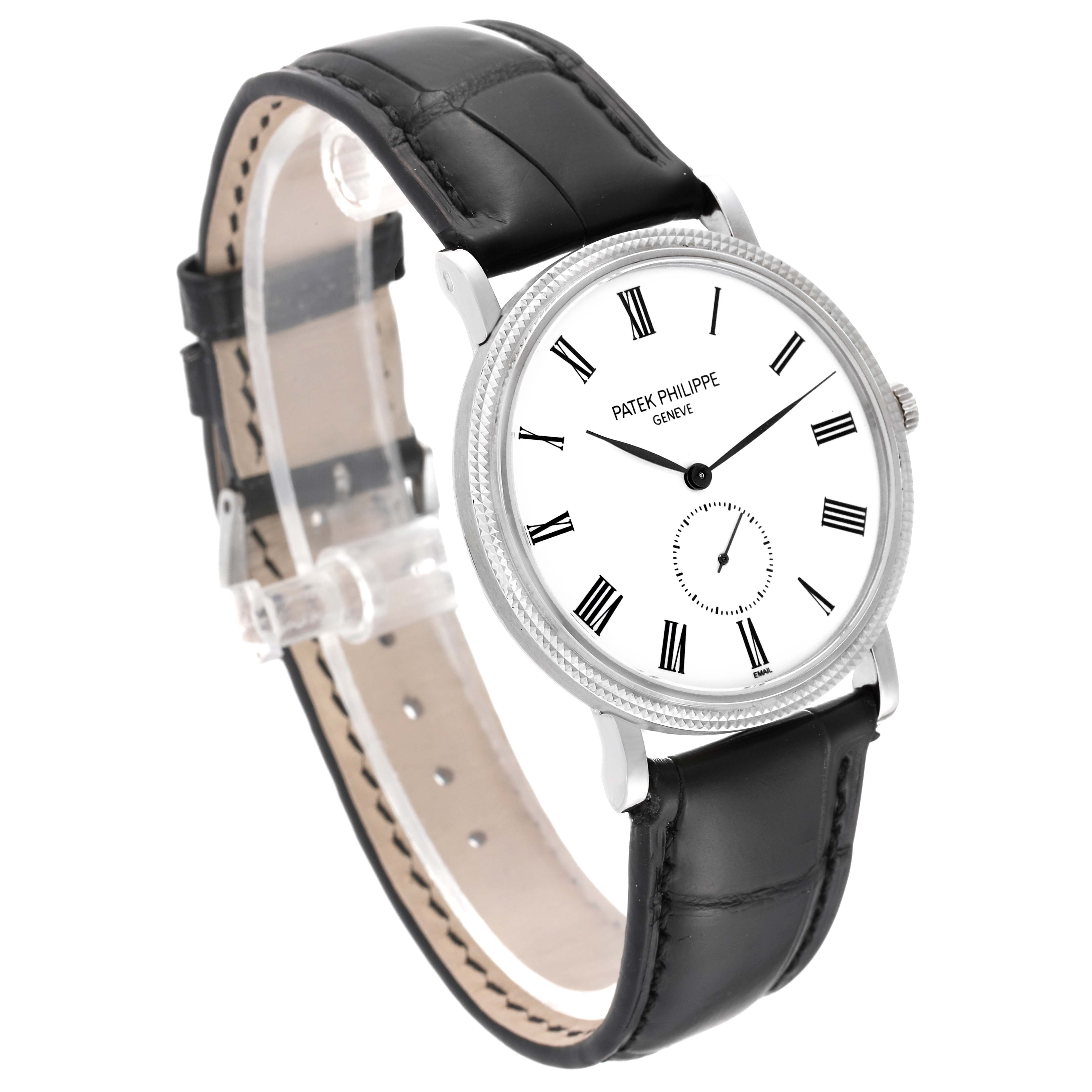 This Patek Philippe Calatrava 5116G Men
s White Gold White Dial 5116G Men
s White Gold White Dial watch is shown at a three-quarter angle, highlighting its white dial and black leather strap.