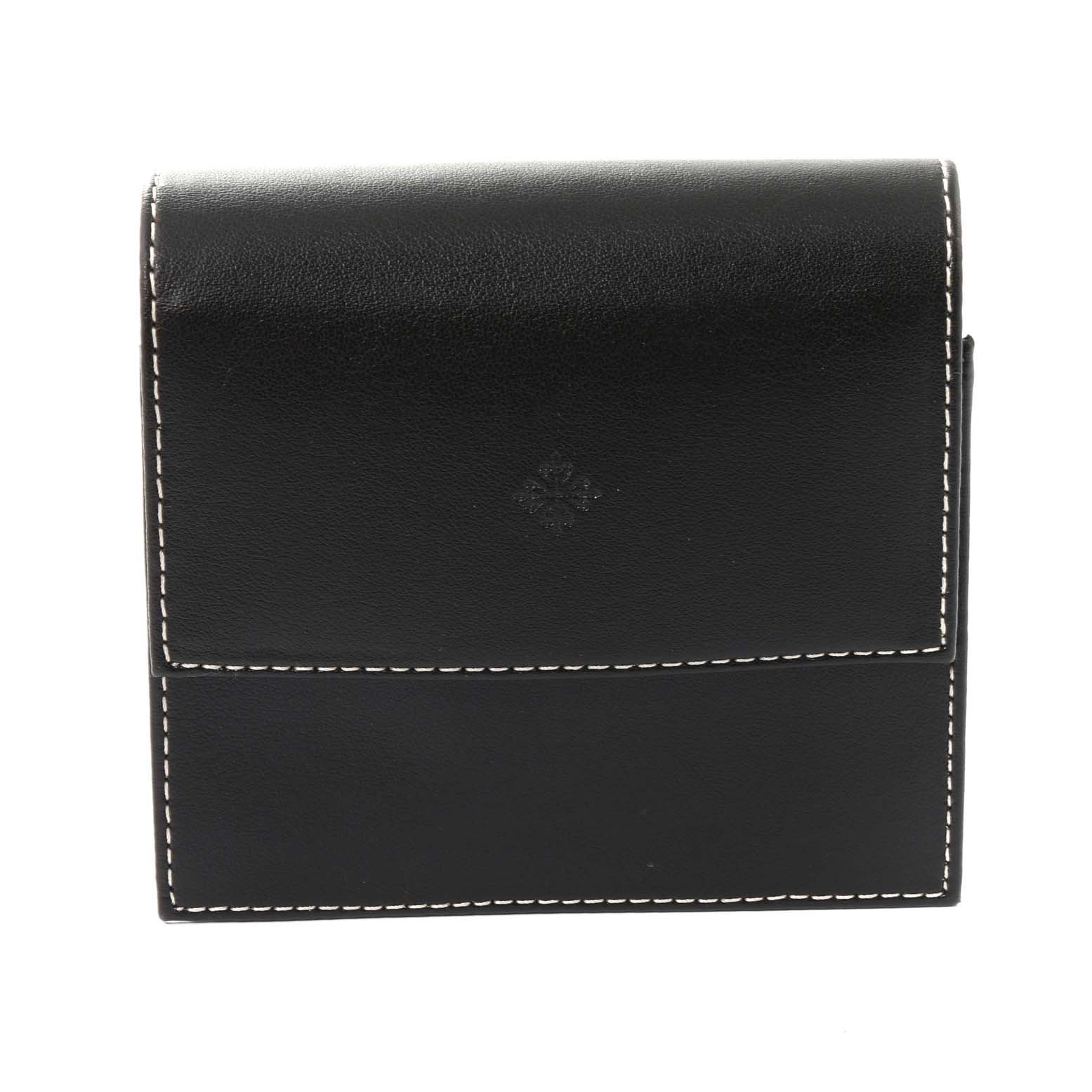 This is a front view of a black leather watch case for the Patek Philippe Calatrava 5116G Men
s White Gold White Dial 5116G Men
s White Gold White Dial model.