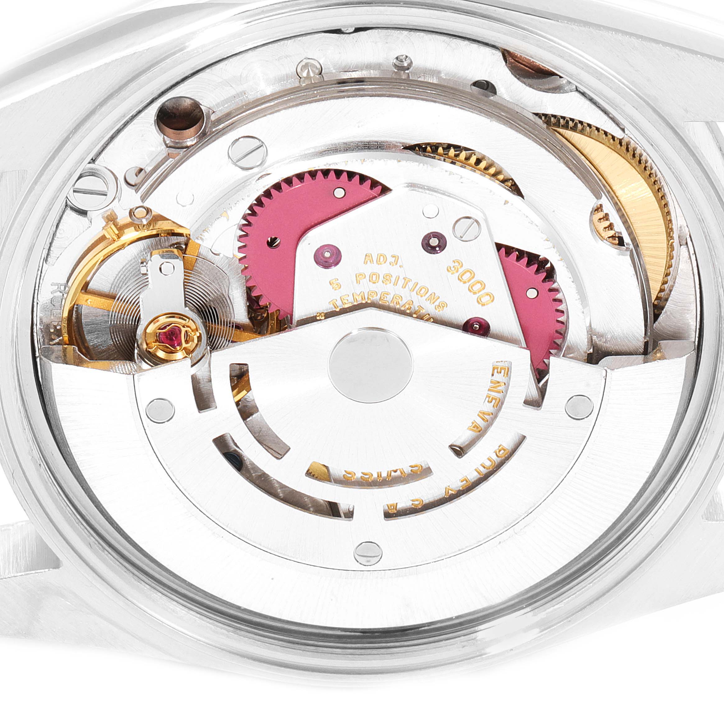 This image shows the internal mechanism of the Rolex Air-King 14000 Men's Stainless Steel Pink Dial 14000 Men's Stainless Steel Pink Dial watch from a rear angle, highlighting gears and parts of the movement.