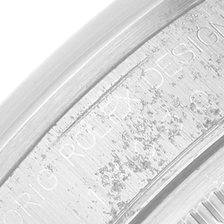 The image shows a close-up of the engraved case back edge of a Rolex Air-King 14000 Men's Stainless Steel Silver Dial 14000 Men's Stainless Steel Silver Dial watch.