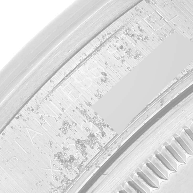 The image shows a close-up of the caseback edge and part of the fluted bezel of a Rolex Air-King 14000 Men's Stainless Steel Silver Dial 14000 Men's Stainless Steel Silver Dial watch.