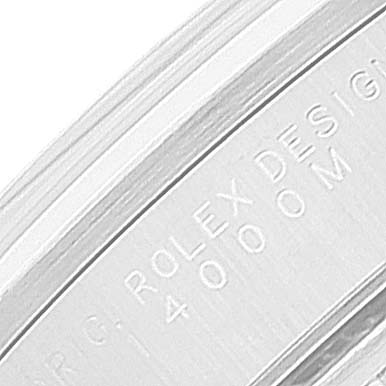 This image shows a close-up of the engraved text on the side of the bezel for a Rolex Air-King 14000M Men's Stainless Steel Black Dial 14000M Men's Stainless Steel Black Dial watch.