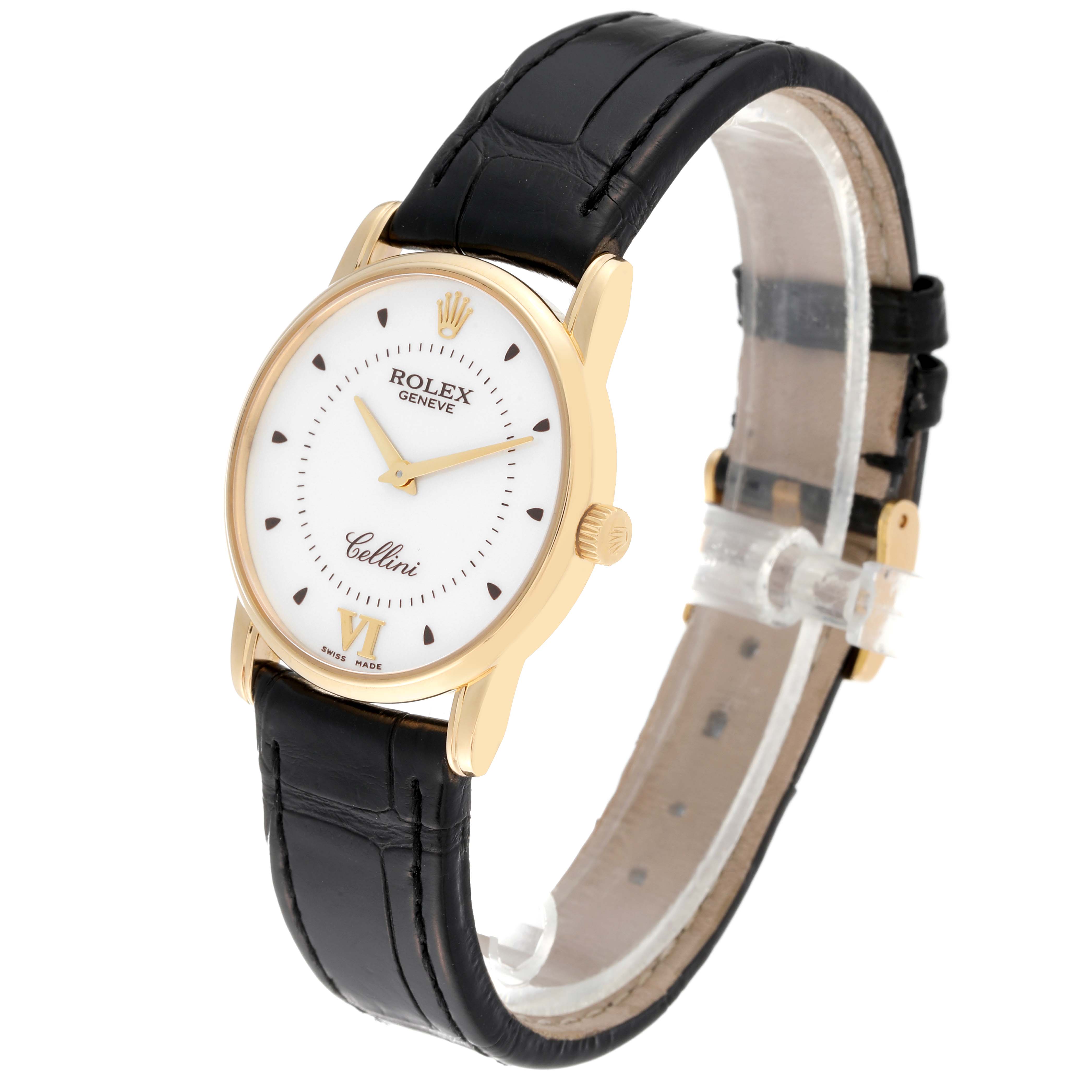 The Rolex Cellini 5116/8 Men's Yellow Gold Silver Dial 5116/8 Men's Yellow Gold Silver Dial watch is shown at a slight angle, displaying its gold case, white dial, and black leather strap.