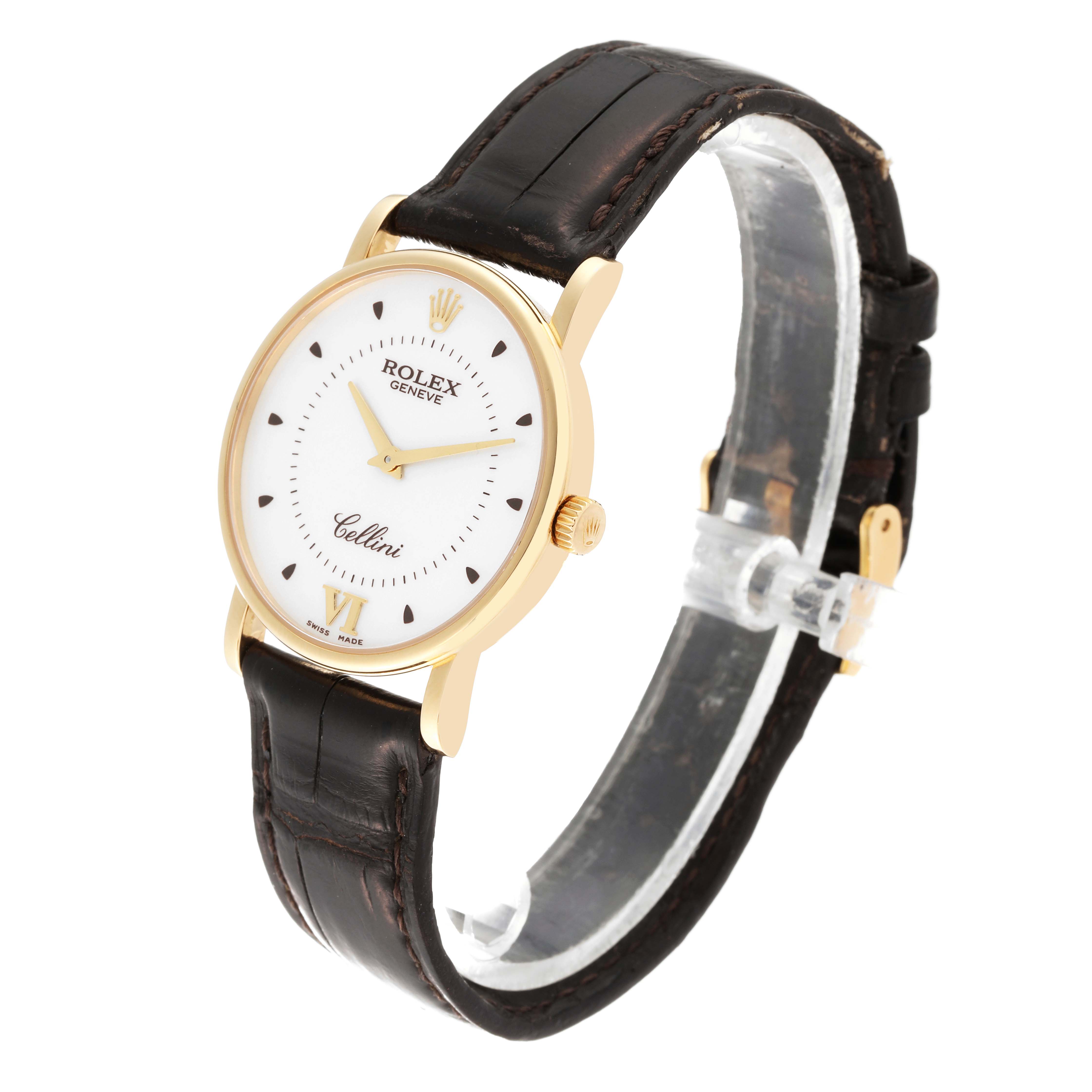 The image shows a Rolex Cellini 5115 Men's Yellow Gold Silver Dial 5115 Men's Yellow Gold Silver Dial watch at a three-quarter angle, highlighting its gold case, white dial, and black leather strap.