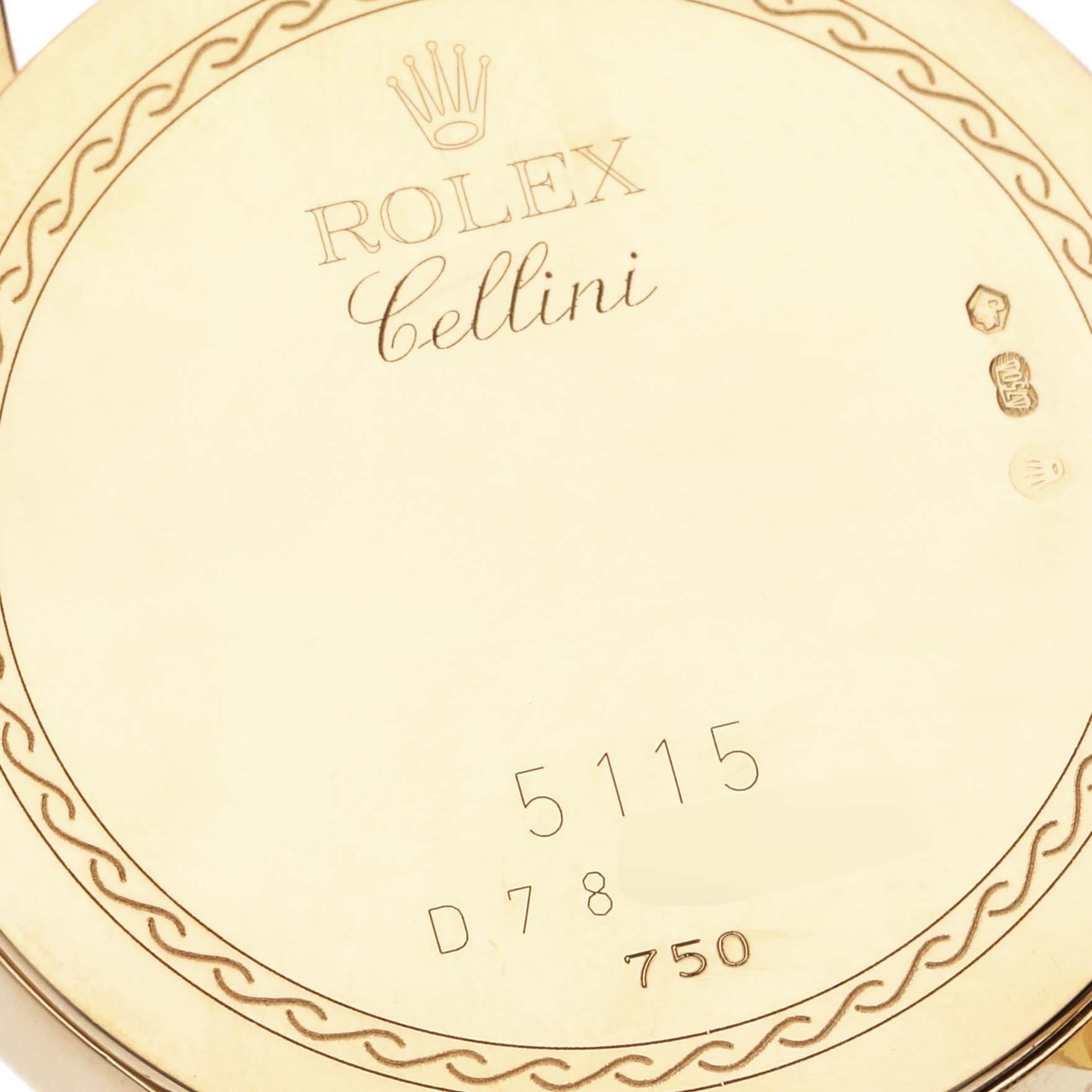 The image shows the engraved back case of a Rolex Cellini 5115 Men's Yellow Gold Silver Dial 5115 Men's Yellow Gold Silver Dial watch with model details and branding in view.