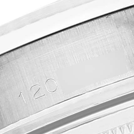 This close-up image shows the brushed metal casing and engravings on the bezel of a Rolex Vintage Collection 6240 Men's Stainless Steel Silver Dial 6240 Men's Stainless Steel Silver Dial model watch.